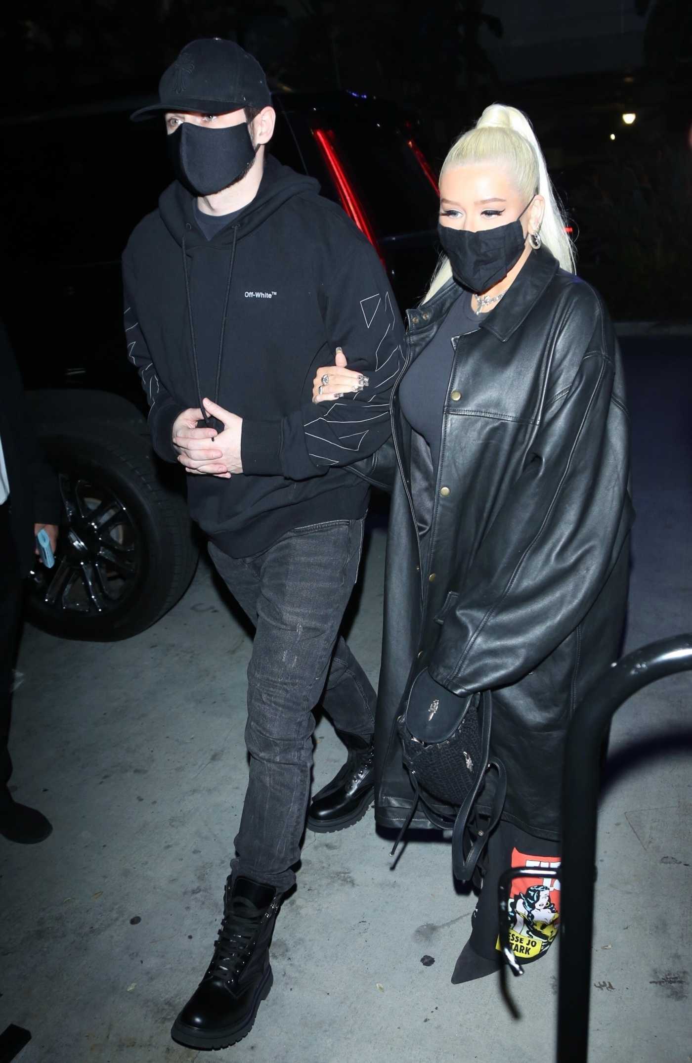 Christina Aguilera in a Black Leather Coat Arrives at the Lakers Game at the Crypto.com Arena in Los Angeles 01/09/2022