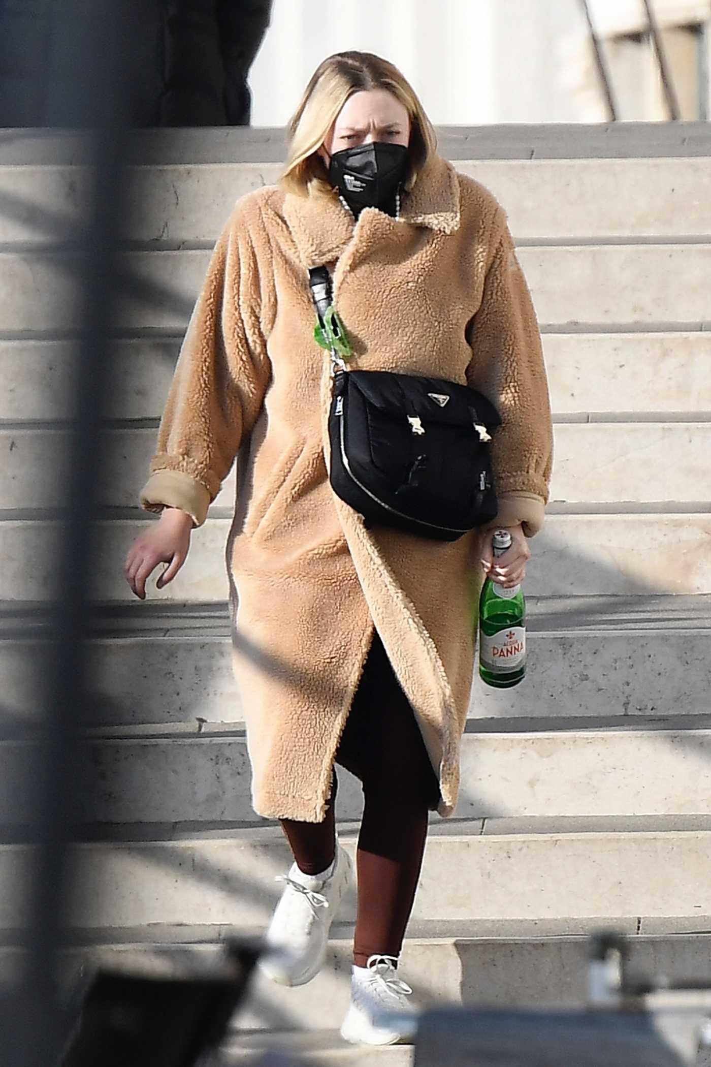Dakota Fanning in a Beige Faux Fur Coat Was Seen Out in Venice 01/29/2022