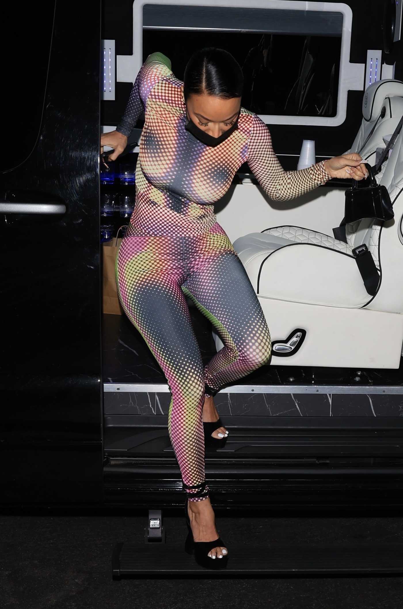 Draya Michele in a Skin Tight Colorful Bodysuit Arrives at TAO Restaurant in Los Angeles 01/22/2022