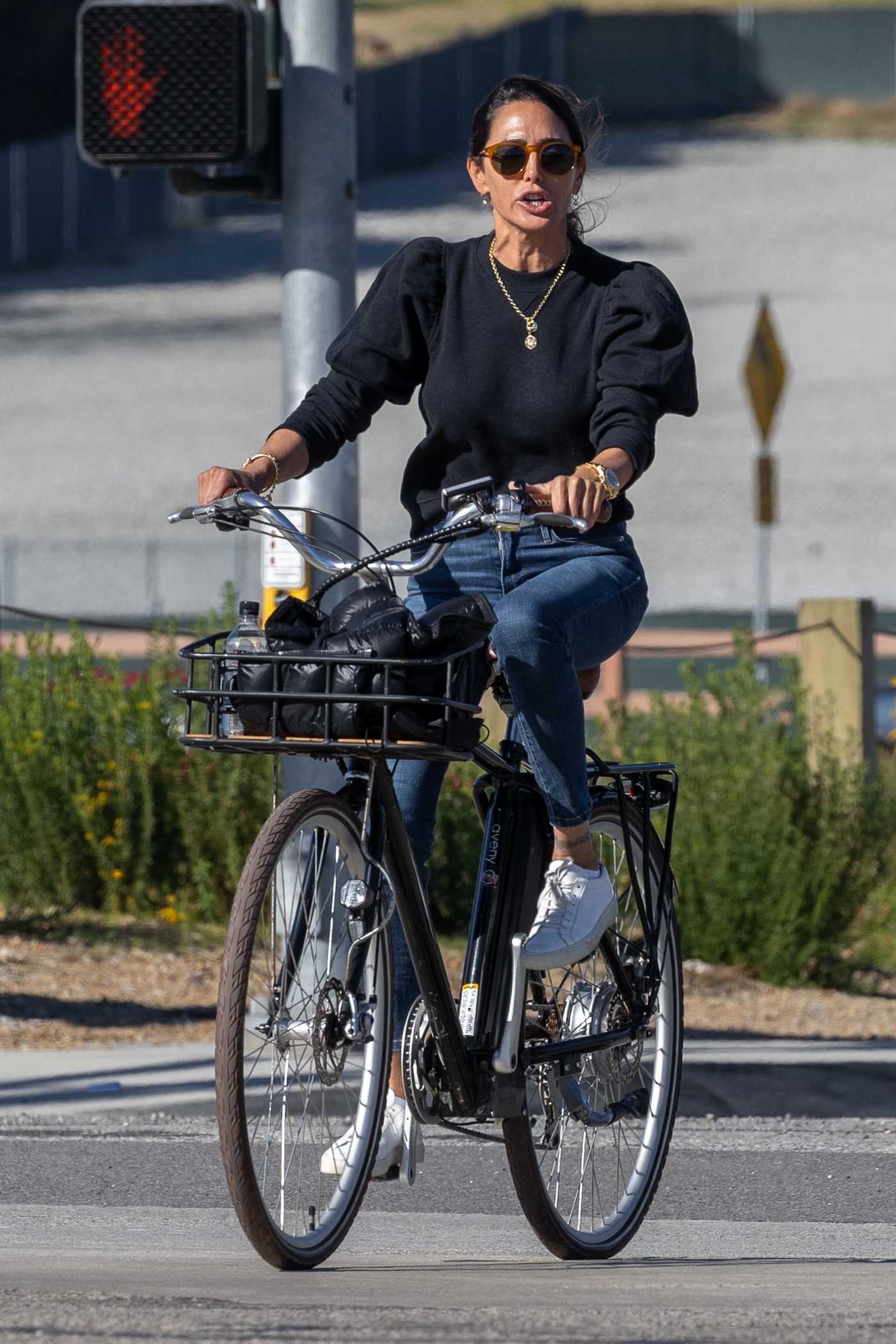 Lauren Silverman in a Black Blouse Does a Bike Ride in Malibu 01/09/2022