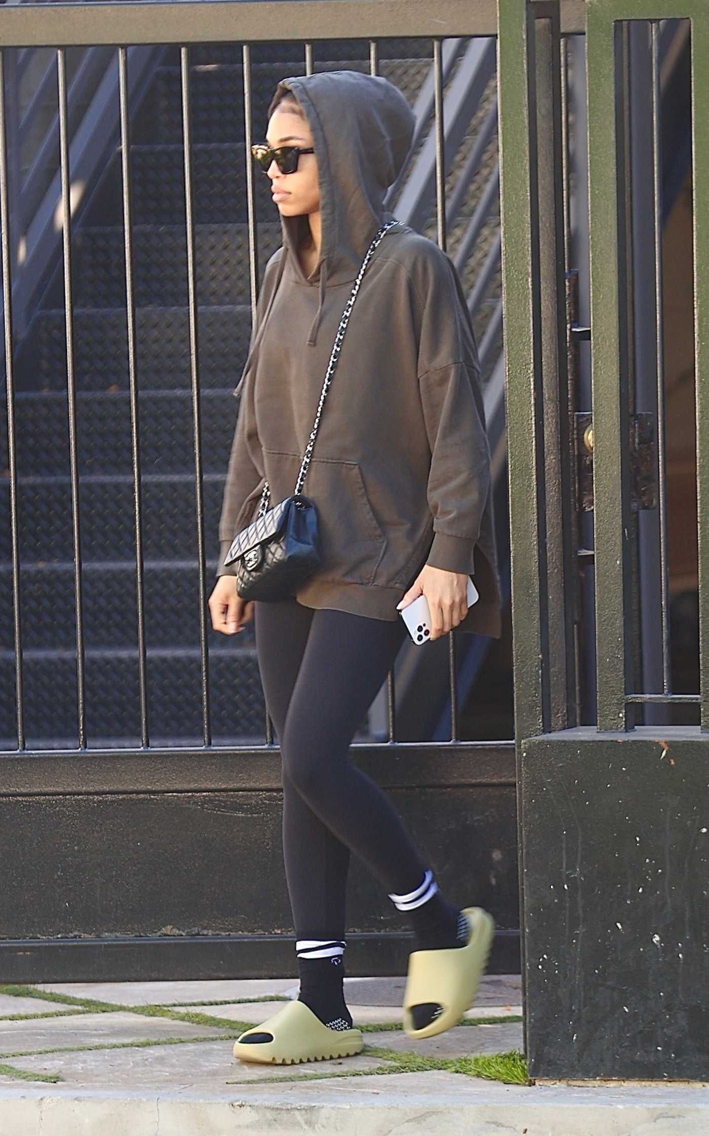 Lori Harvey in a Grey Hoodie Leaves Her Pilates Workout in West Hollywood 01/06/2022