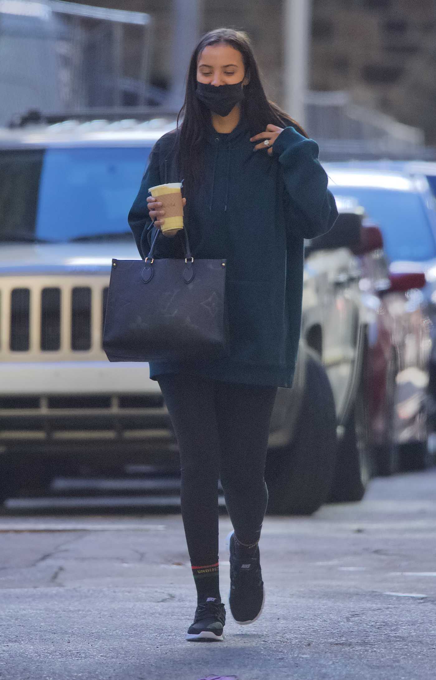Maya Jama in a Black Protective Mask Grabs Coffee in Philadelphia 01/10/2022