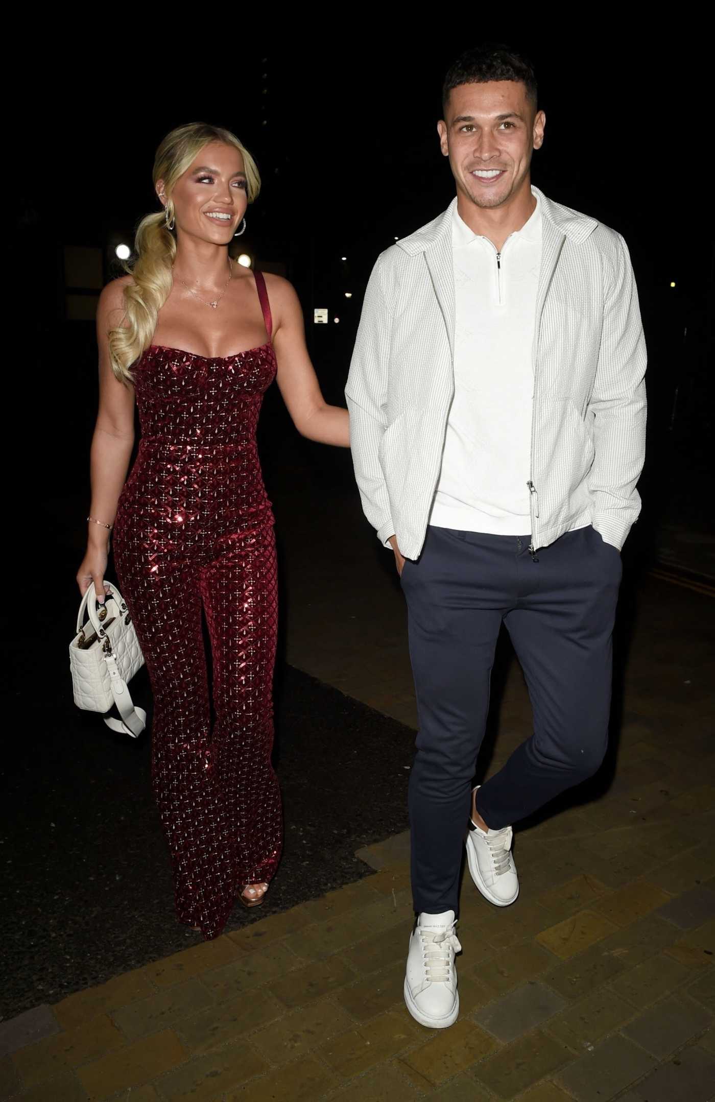Molly Smith in a Burgundy Color Catsuit Arrives on New Year Eve Date Night with Callum Jones at Menagerie Bar and Restaurant in Manchester 12/31/2021