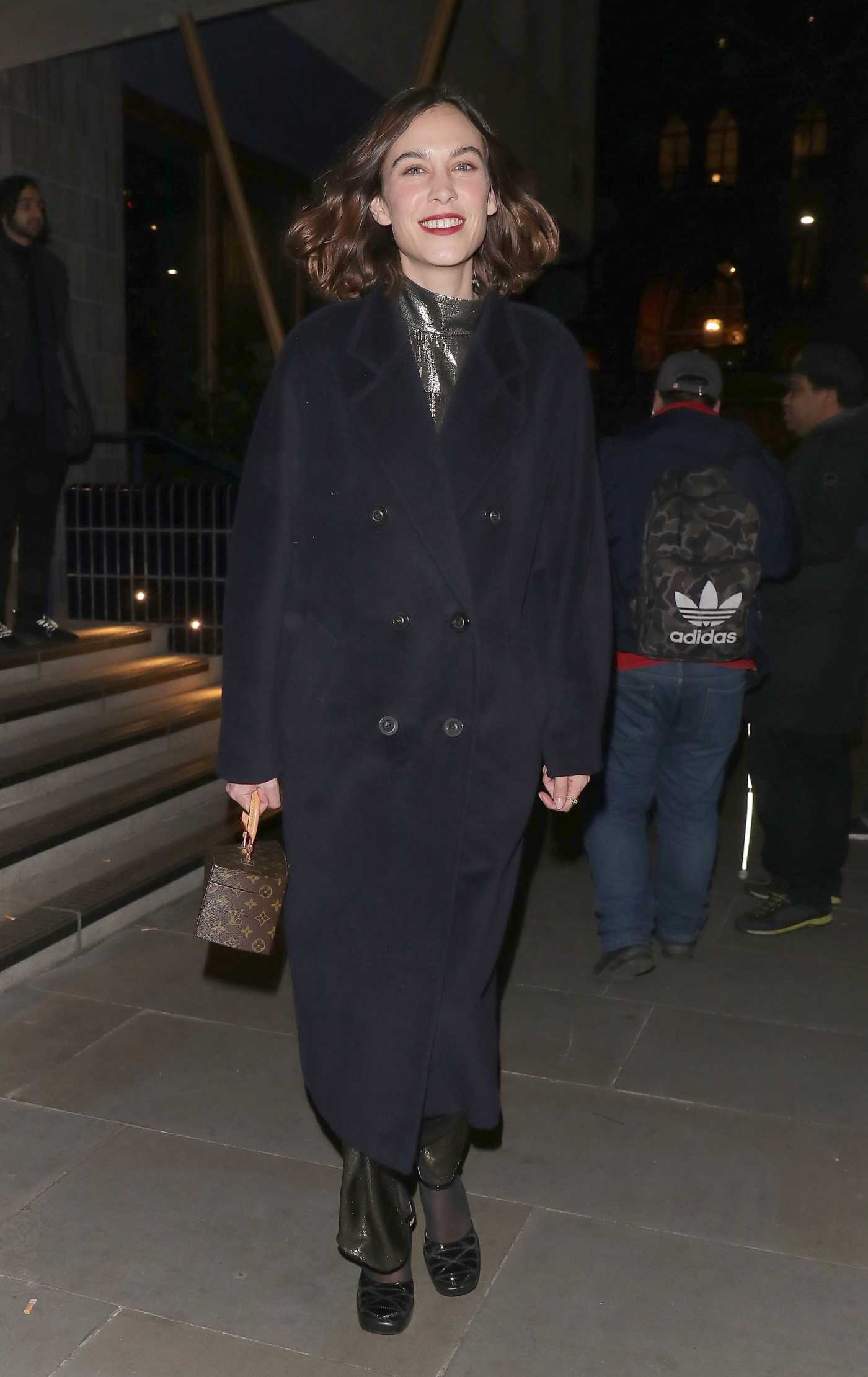 Alexa Chung in a Black Coat Leaves the Perfect Magazine LFW Party in London 02/21/2022
