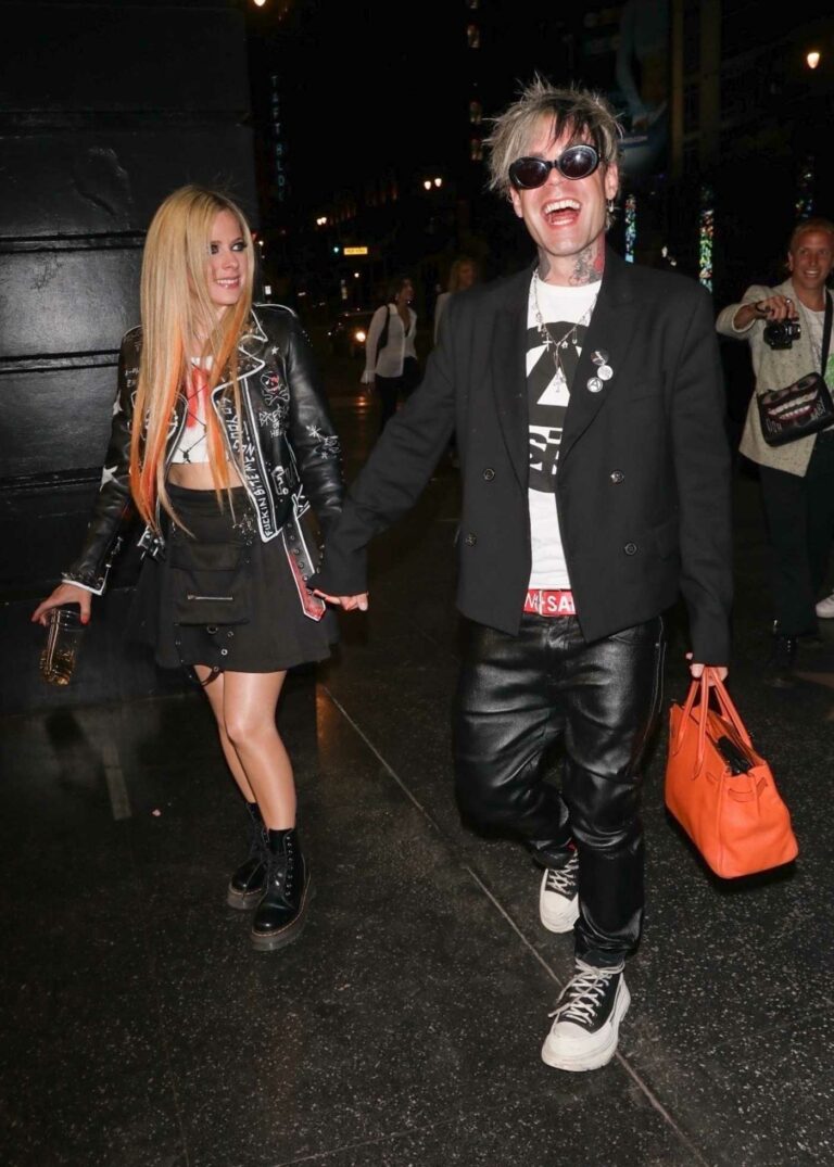 Avril Lavigne in a Black Boots