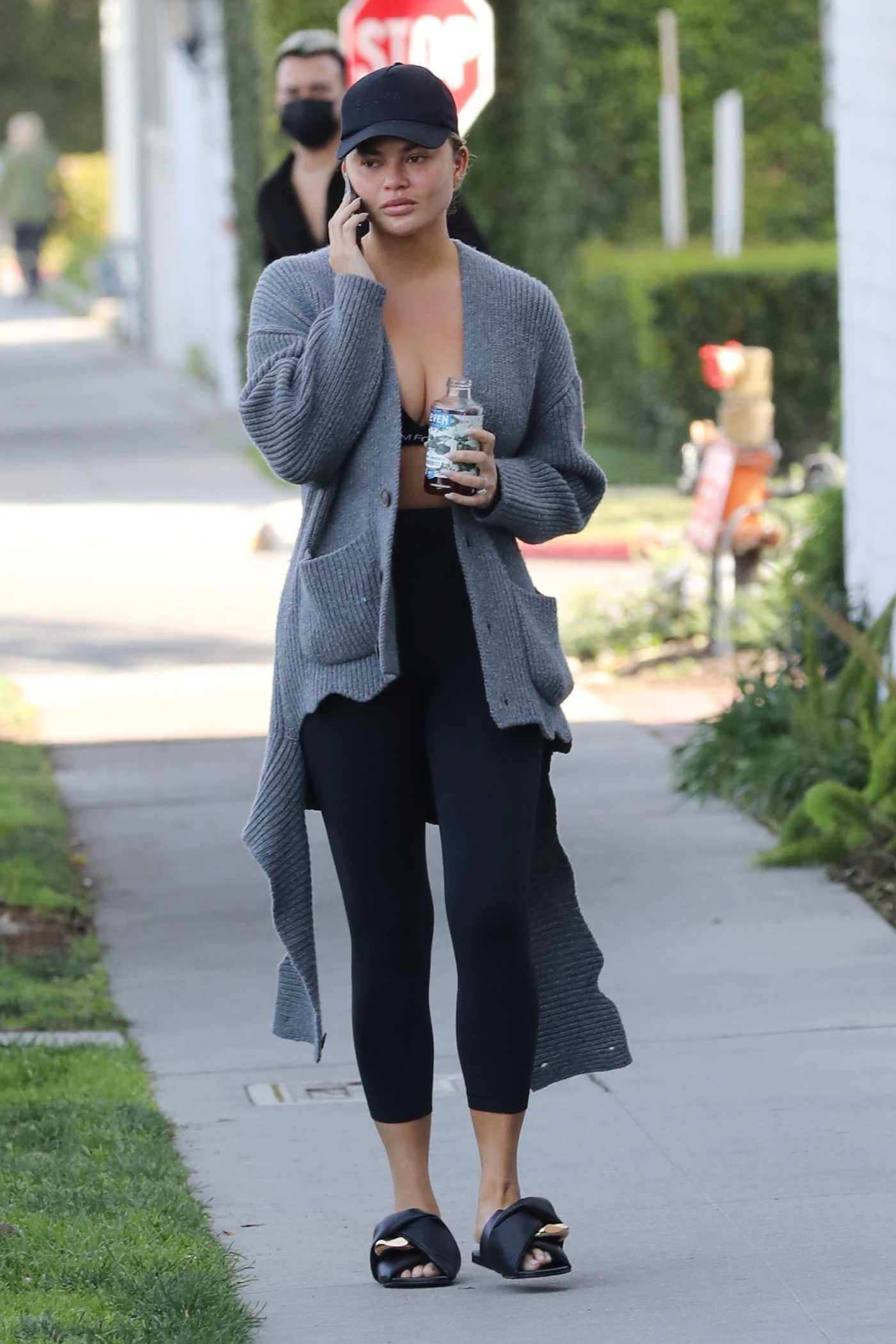 Chrissy Teigen in a Grey Cardigan Was Seen Out in Los Angeles 02/08/2022