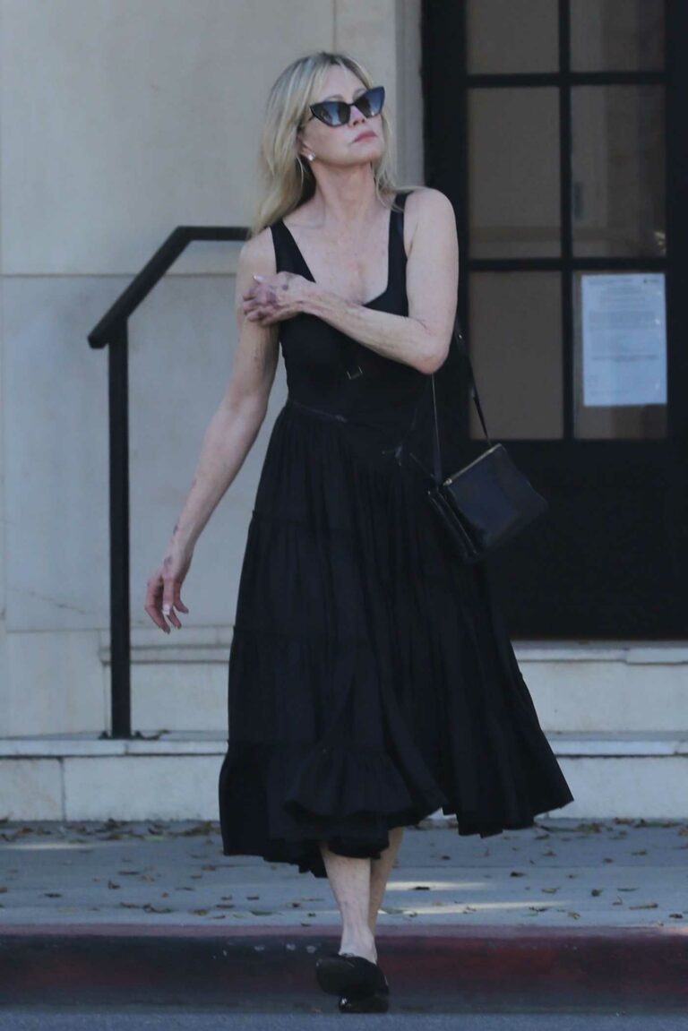 Melanie Griffith in a Black Dress