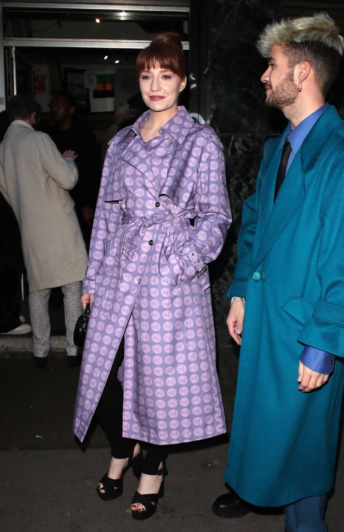 Nicola Roberts in a Purple Trench Coat Leaves the Mark Fast Fashion Show During 2022 London Fashion Week in London 02/17/2022