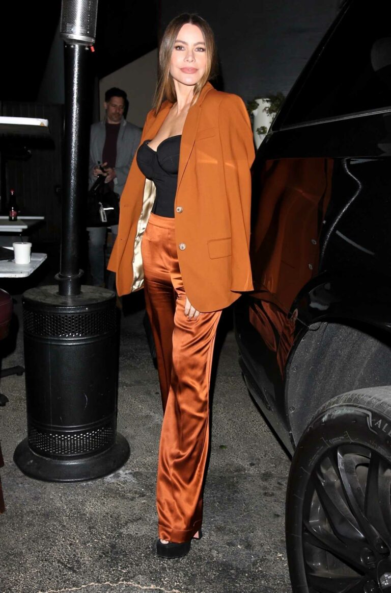 Sofia Vergara in an Orange Blazer