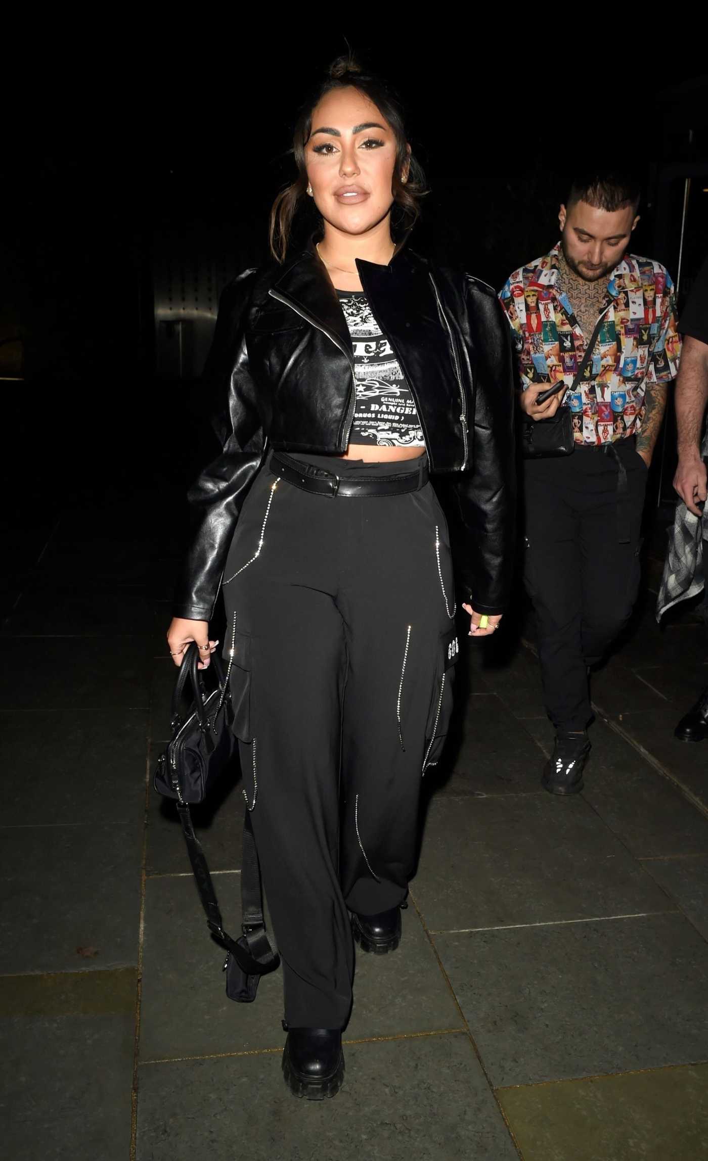 Sophie Kasaei in a Black Leather Jacket Enjoys a Night Out with Friends at Alberts Schloss in Manchester 02/15/2022