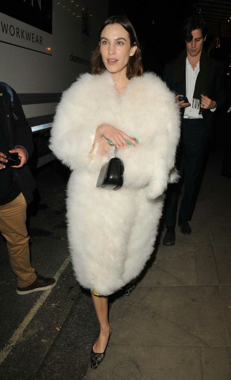 Alexa Chung in a White Fur Coat