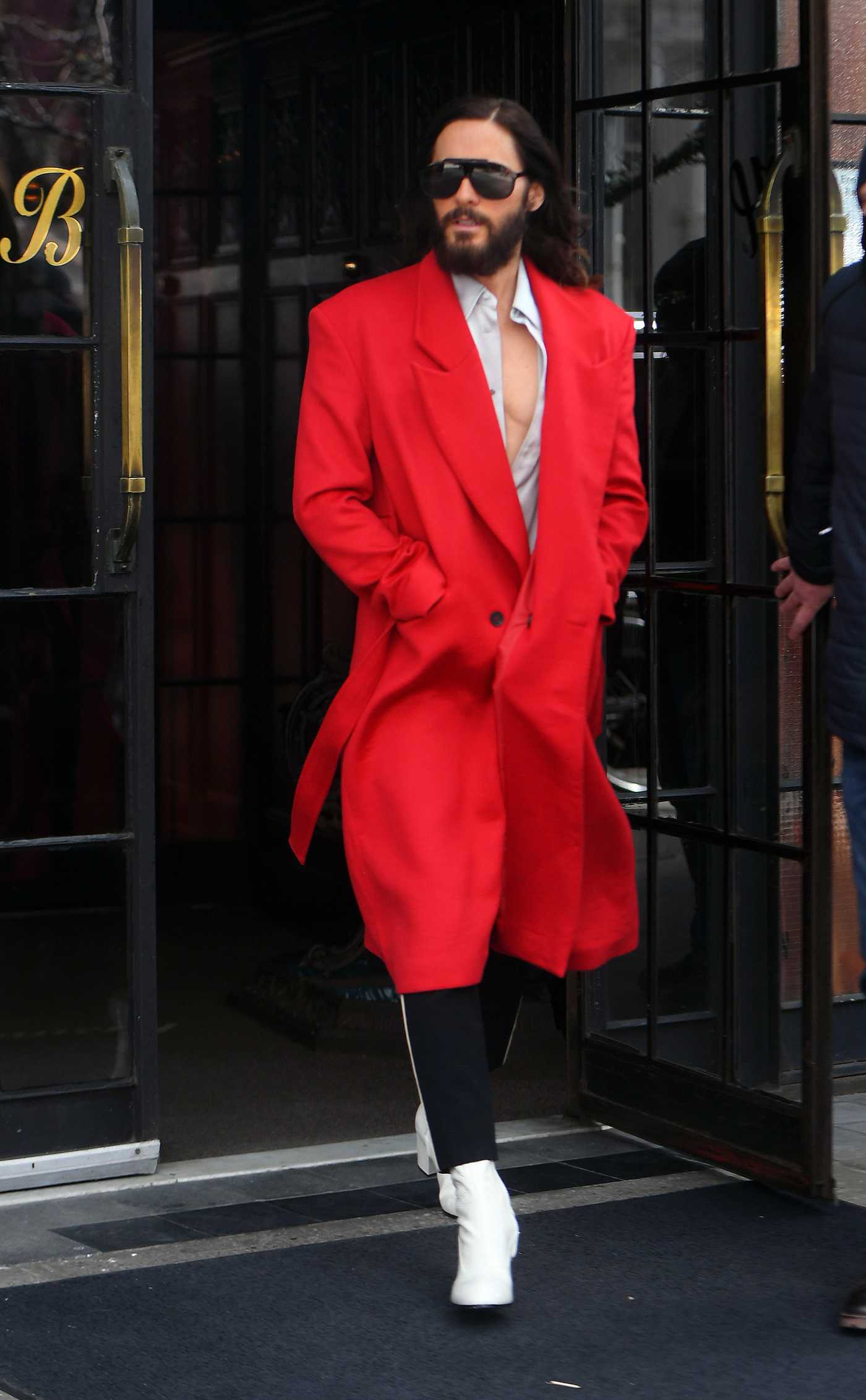 Jared Leto in a Red Coat Leaves His Hotel in New York 03/29/2022