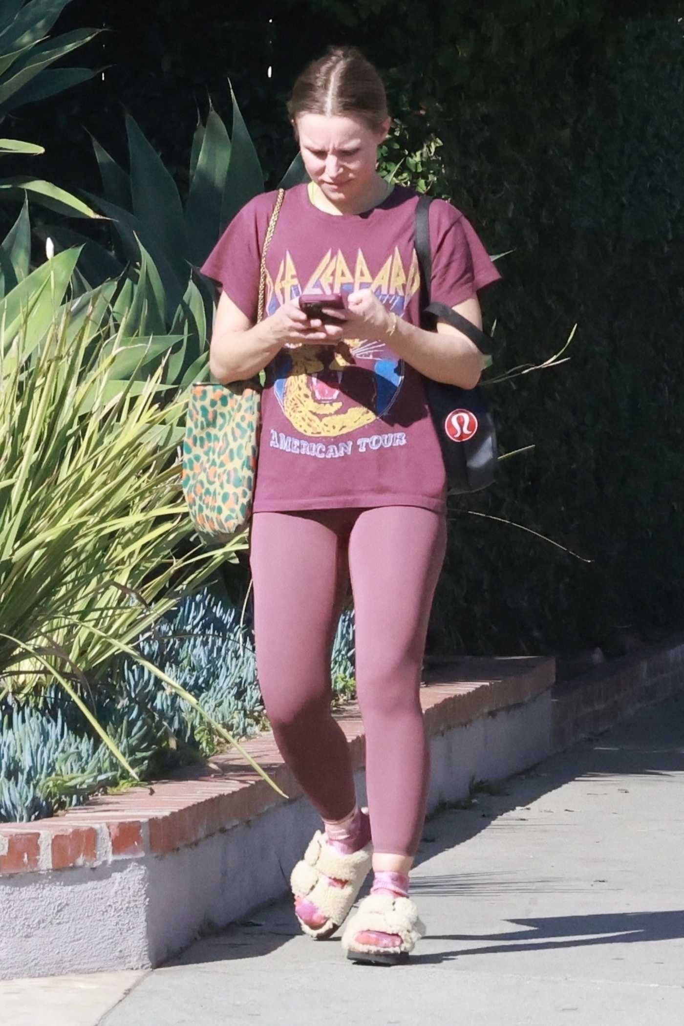 Kristen Bell in a Burgundy Coloured Workout Ensemble Leaves Her Local Gym in Los Feliz 03/22/2022