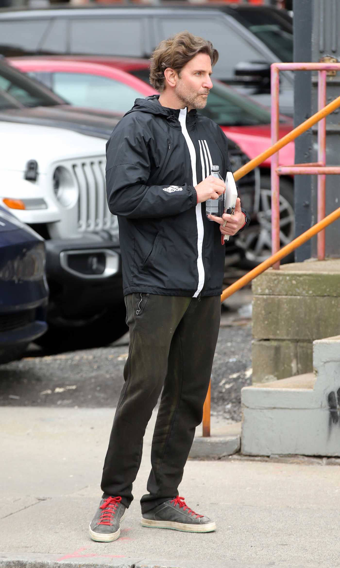 Bradley Cooper in a Black Windbreaker Was Seen Out in New York 03/30/2022