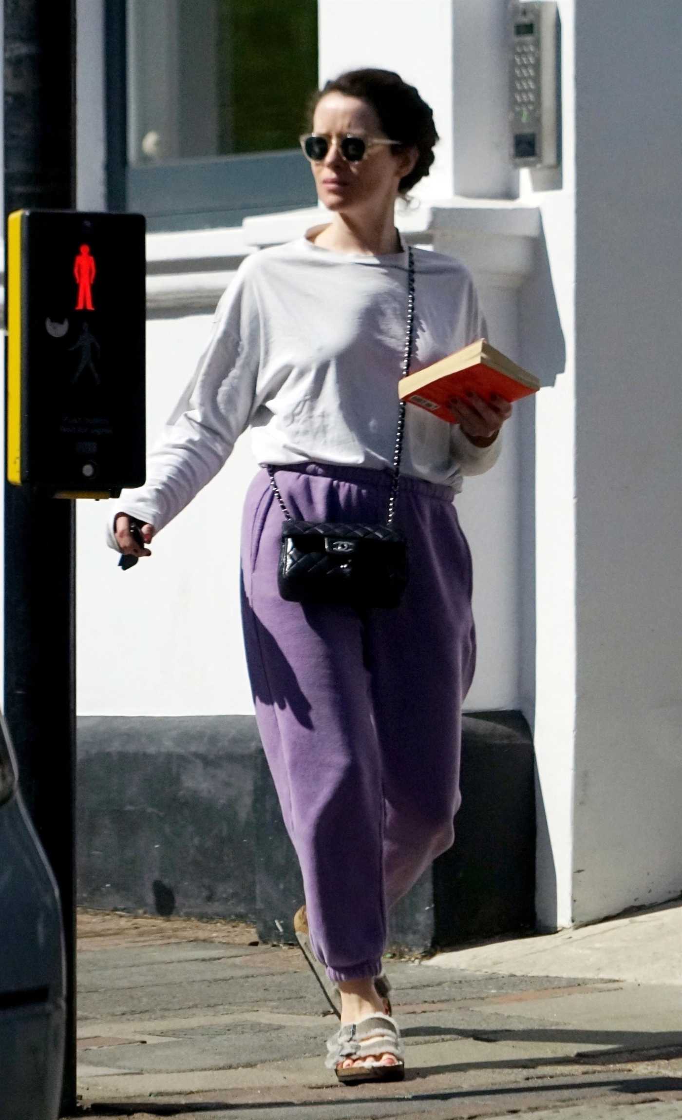 Claire Foy in a Purple Sweatpants Was Seen Out in Hampstead in North London 04/21/2022