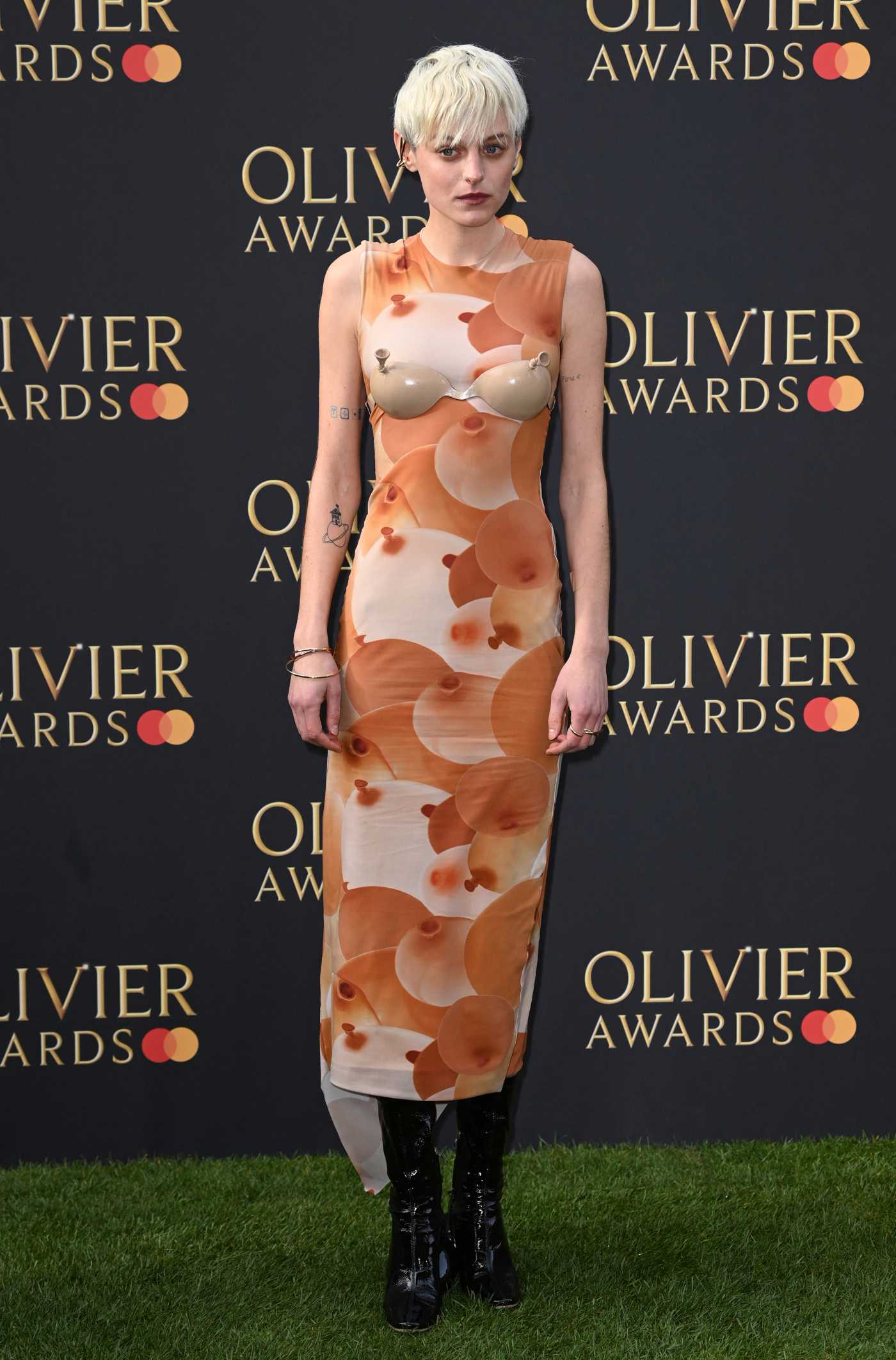 Emma Corrin Attends 2022 Olivier Awards at Royal Albert Hall in London 04/10/2022