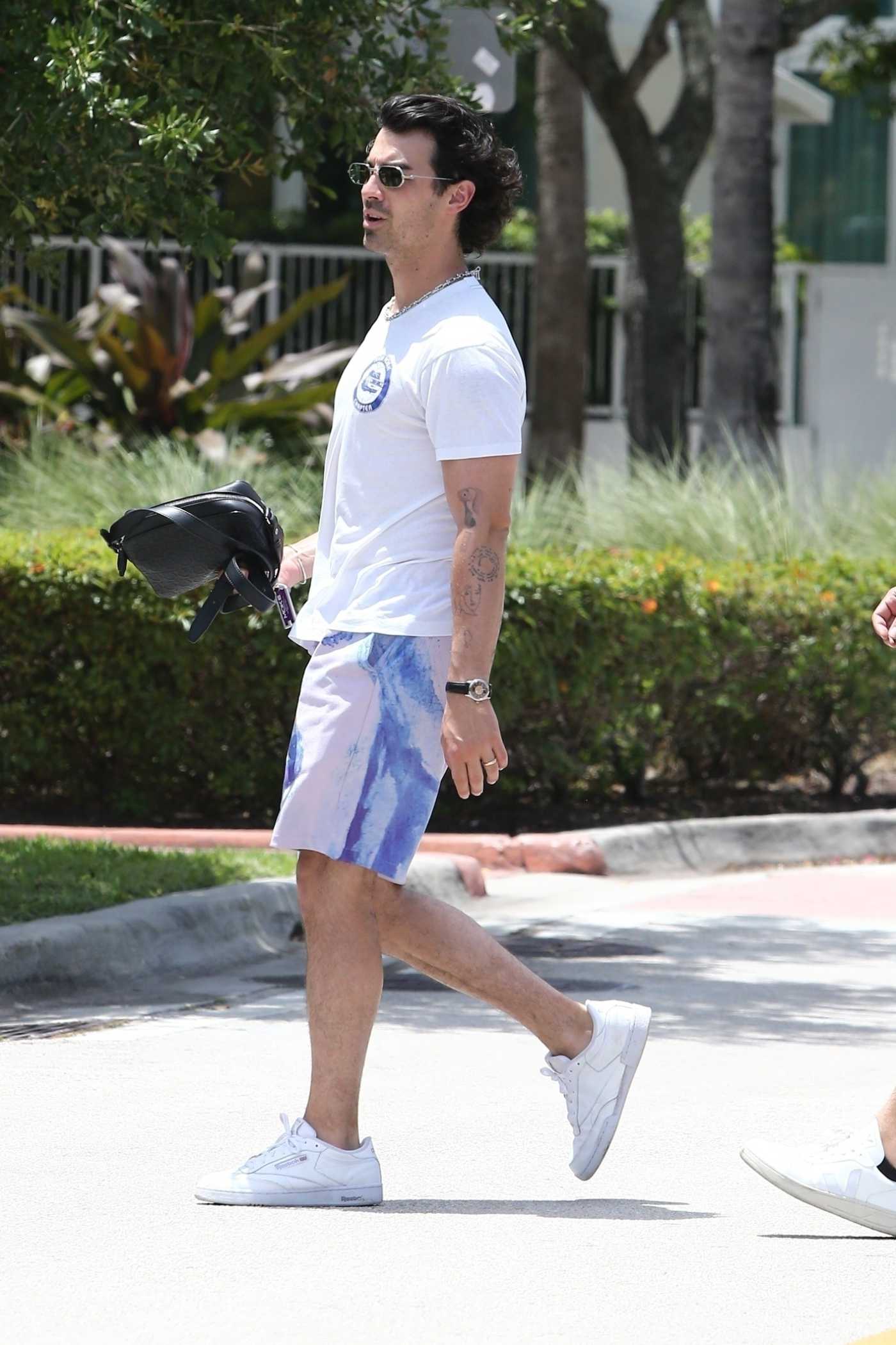 Joe Jonas in a White Tee Was Seen Out in Miami 04/21/2022