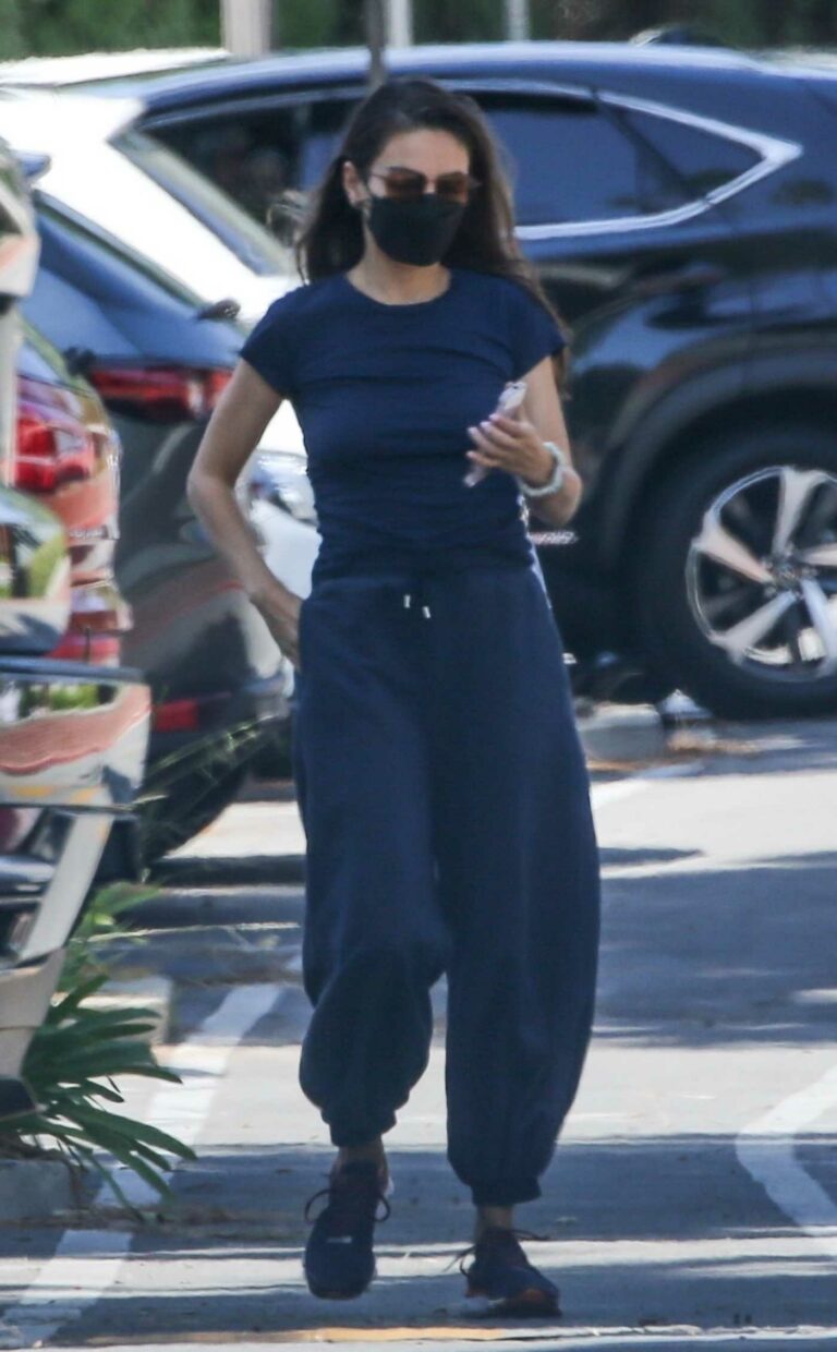 Mila Kunis in a Blue Sweatpants