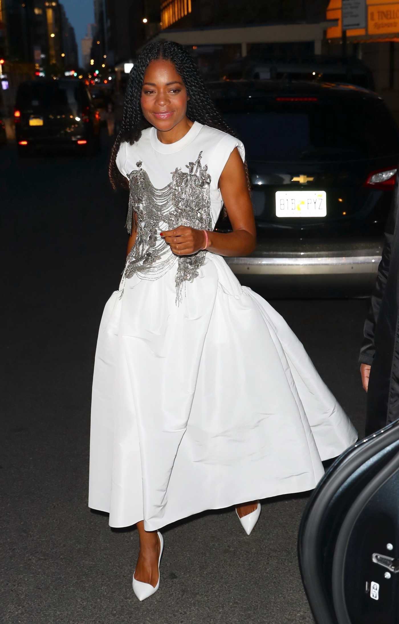 Naomie Harris in a White Dress Arrives for a Private Event at Omega 5th Avenue in New York 04/20/2022