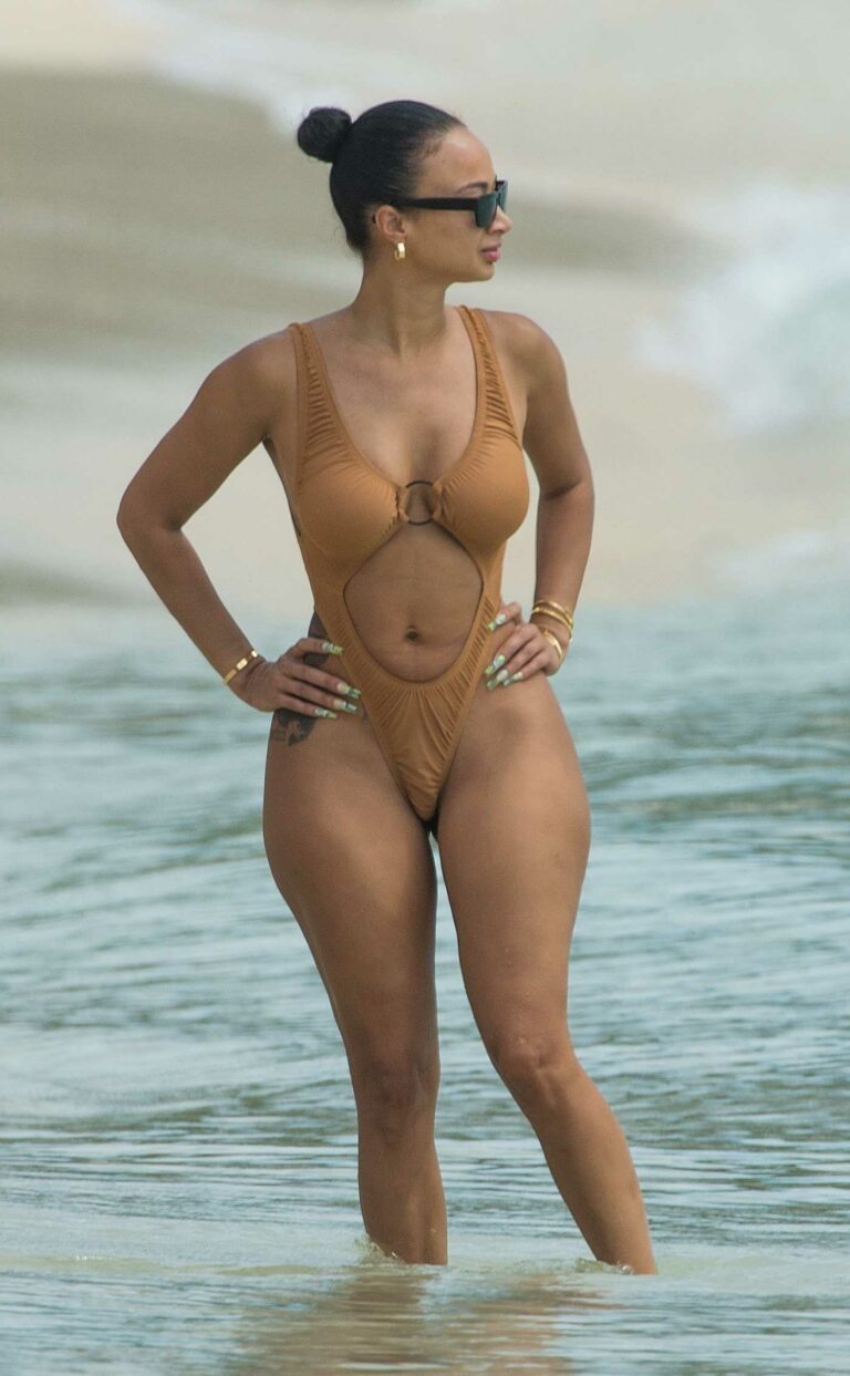 Draya Michele in a Tan Swimsuit