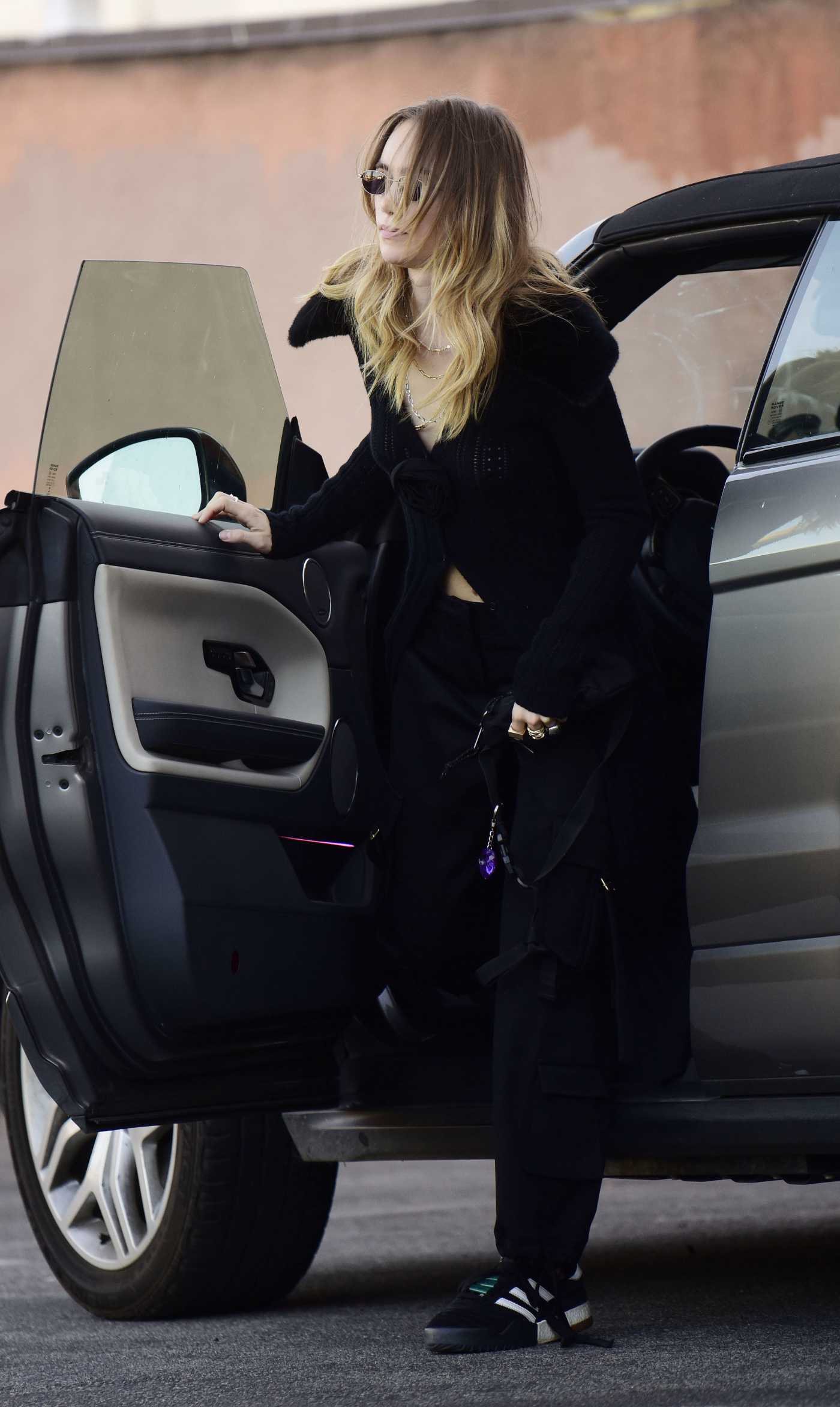 Suki Waterhouse in a Black Cardigan Was Seen Out in Los Angeles 05/18/2022