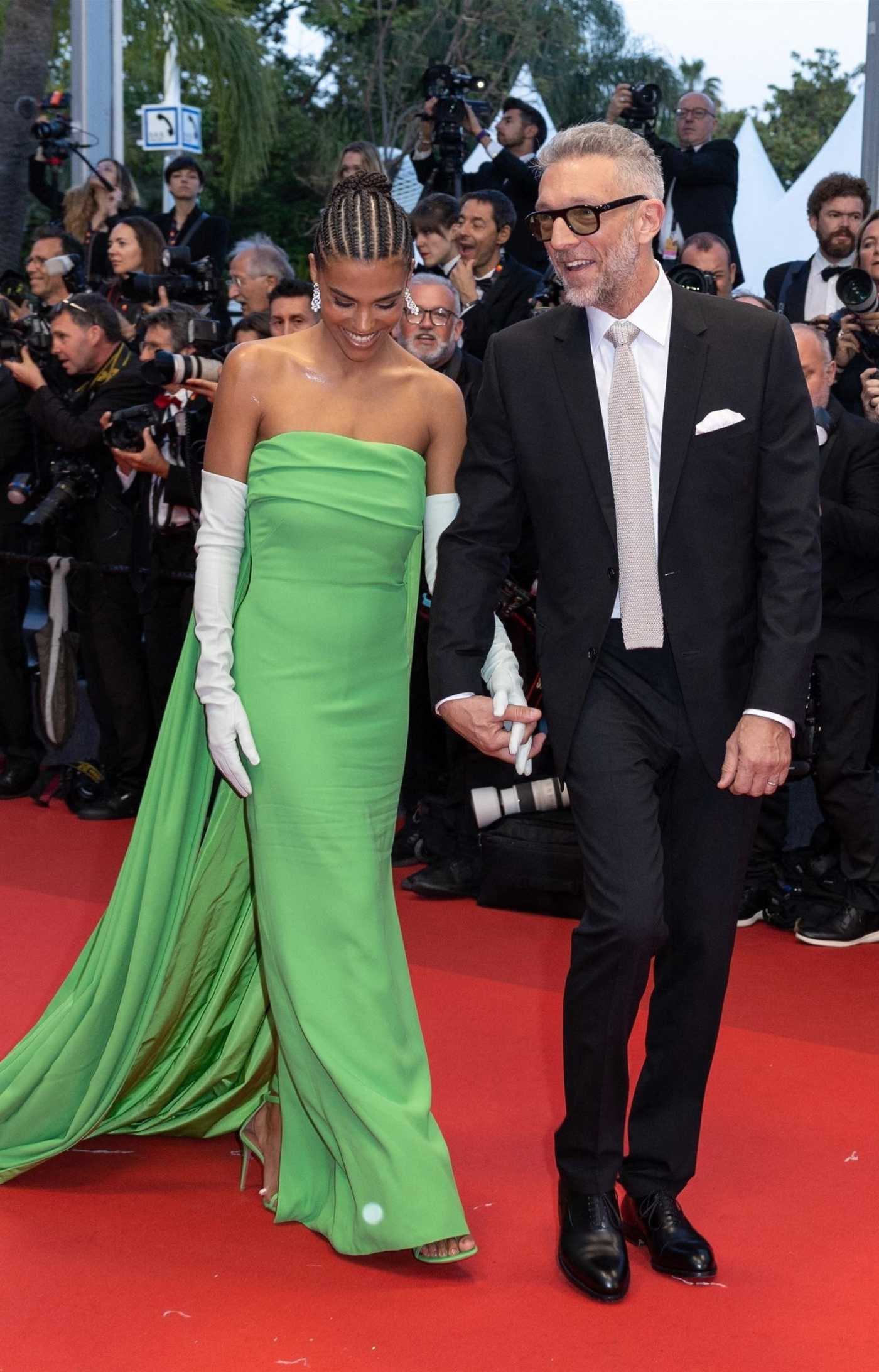 Tina Kunakey Attends the Crimes of The Future Photocall with Vincent Cassel During the 75th Annual Cannes Film Festival in Cannes 05/24/2022