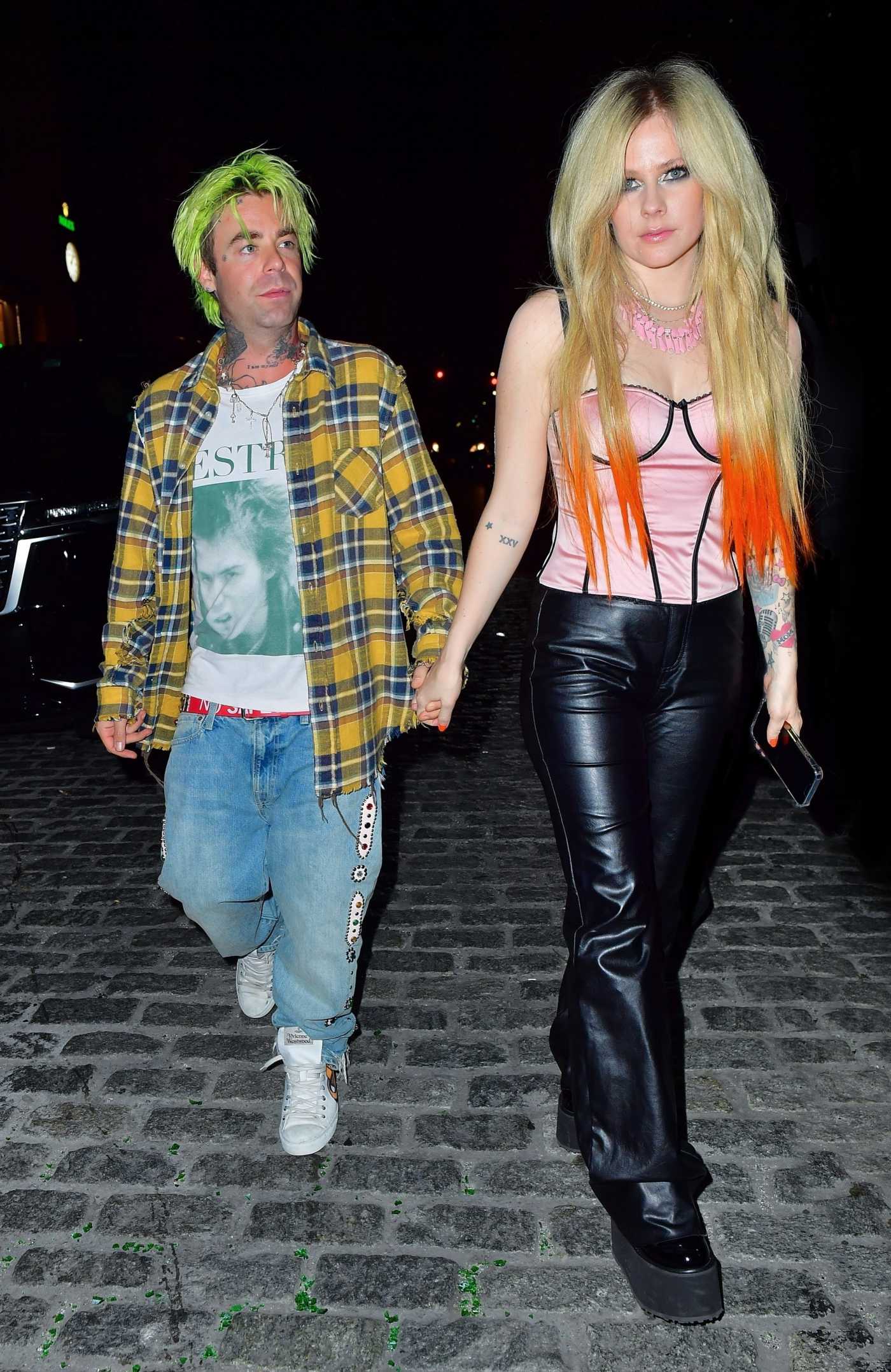 Avril Lavigne in a Black Pants Goes Hand in Hand with Her Boyfriend Mod Sun in New York 06/28/2022