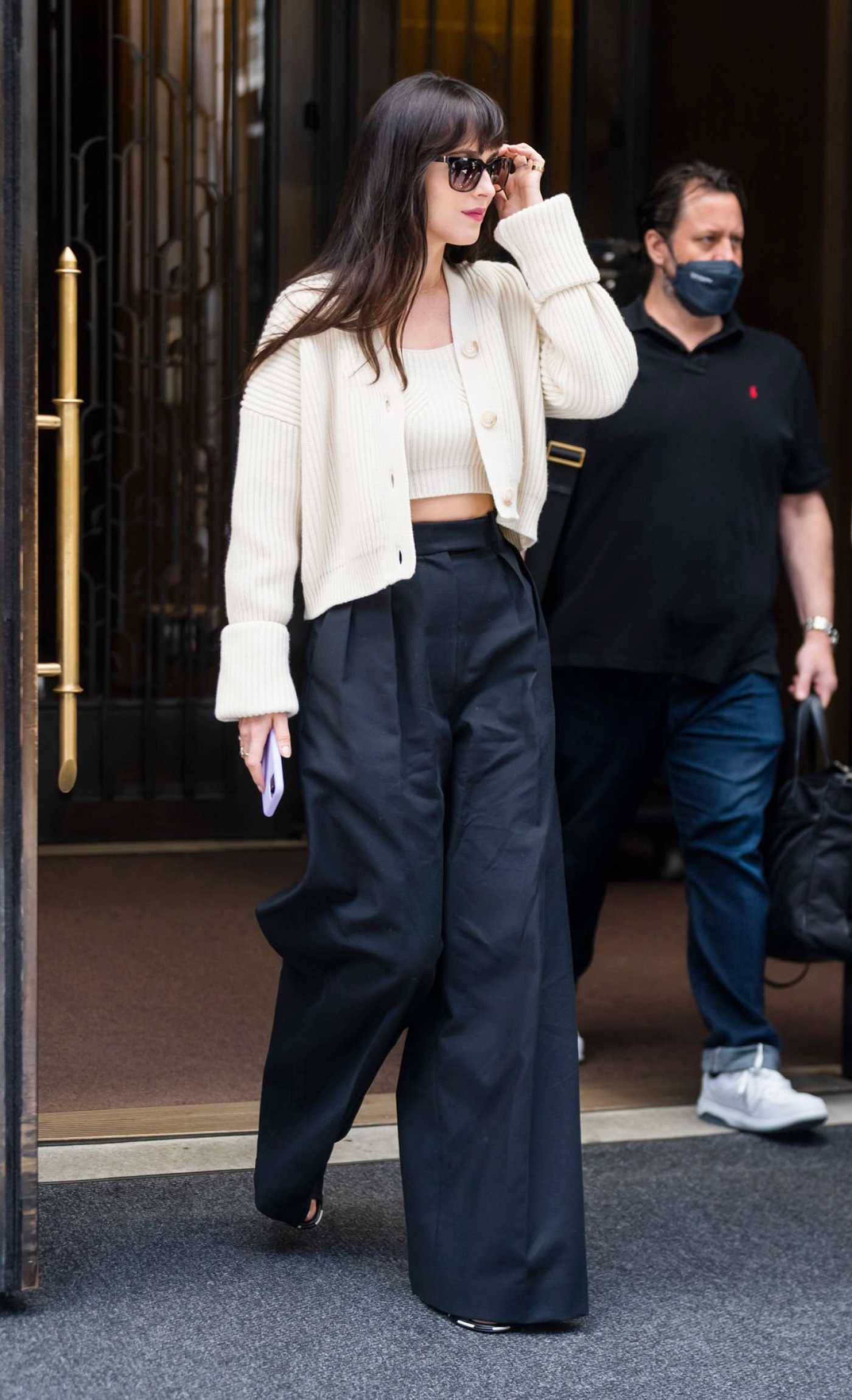 Dakota Johnson in a Black Pants Was Seen Out in New York City 06/14/2022