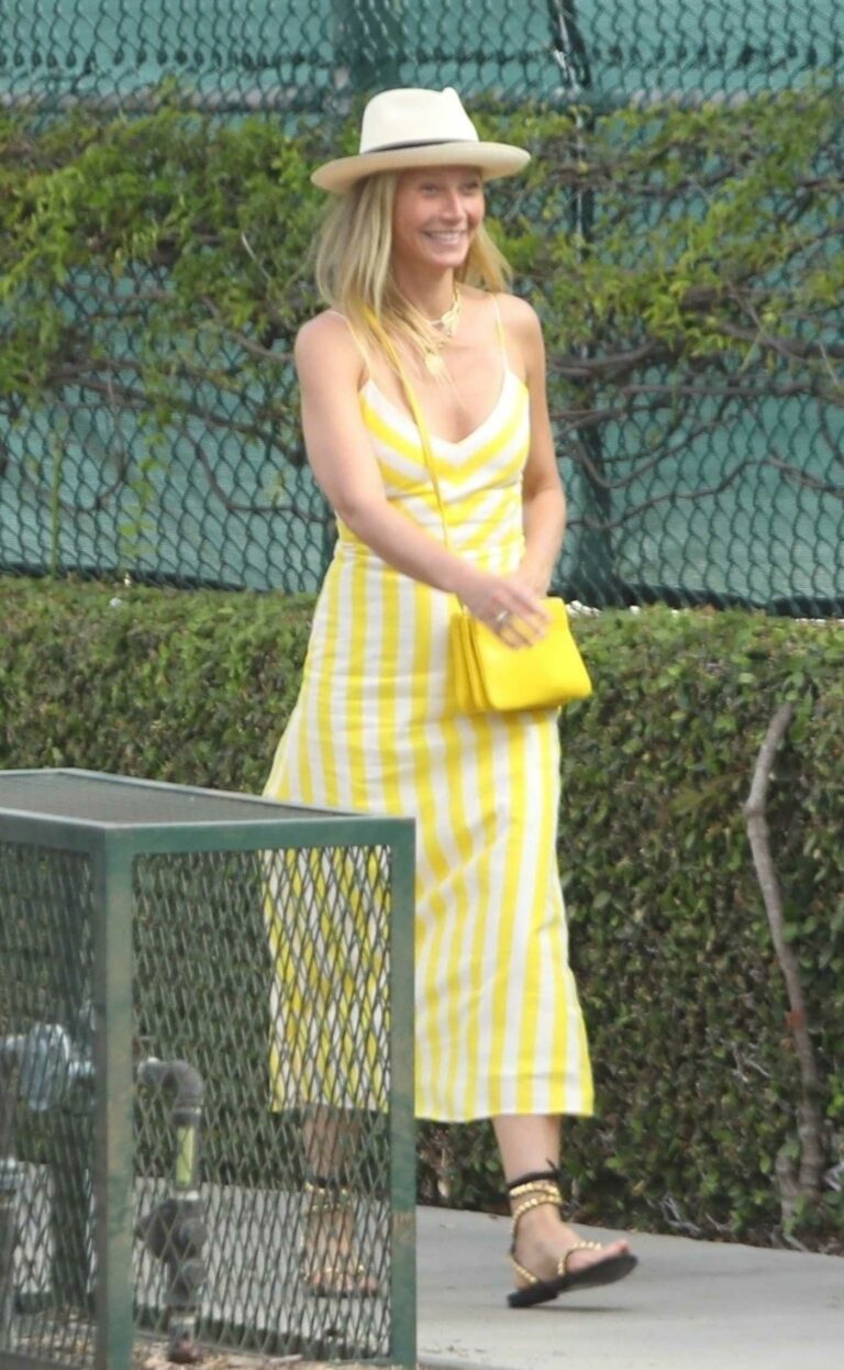 Gwyneth Paltrow in a Yellow Striped Dress