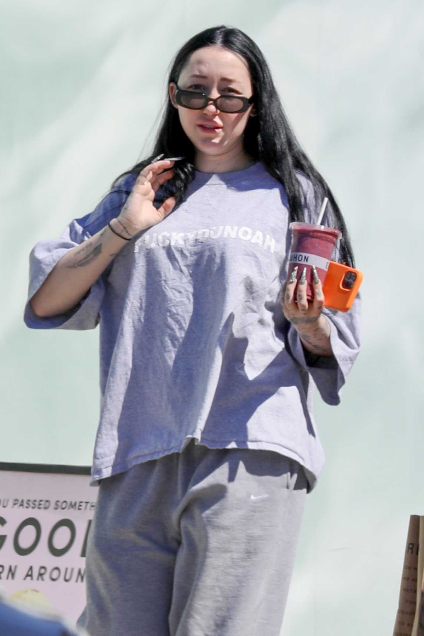 Noah Cyrus in a Grey Tee Was Seen Out with Her Boyfriend in Santa Monica 06/20/2022
