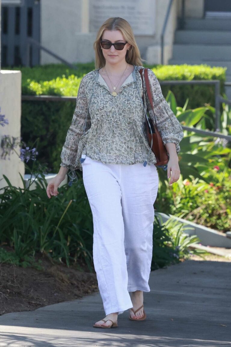 Olivia Macklin in a White Pants