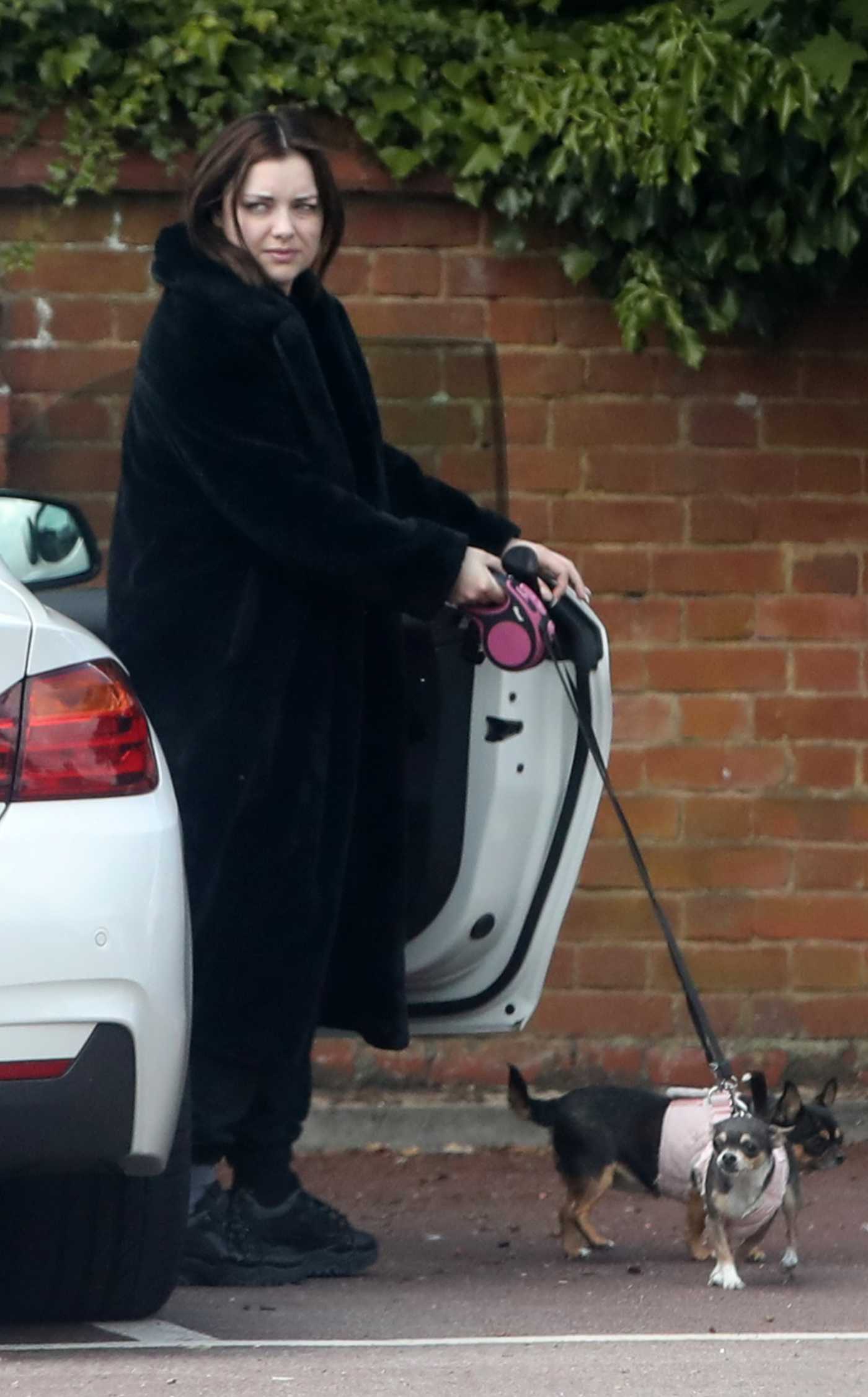 Shona McGarty in a Black Outfit Walks Her Dogs in Stevenage 06/04/2022