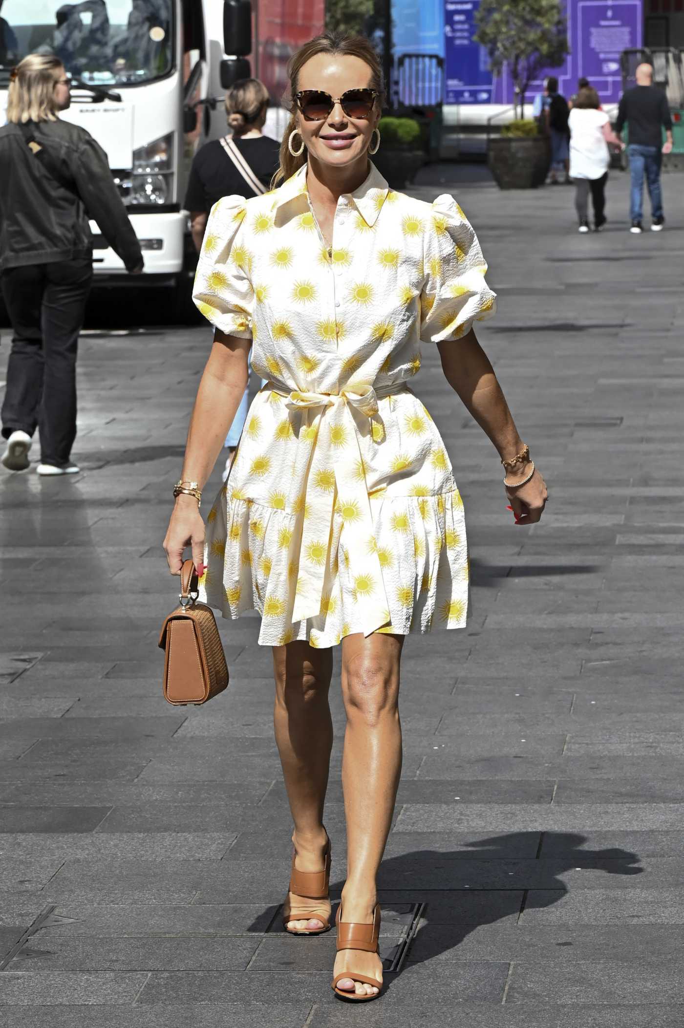 Amanda Holden in a Sun Print Dress Leaves the Global Studios in London 07/04/2022