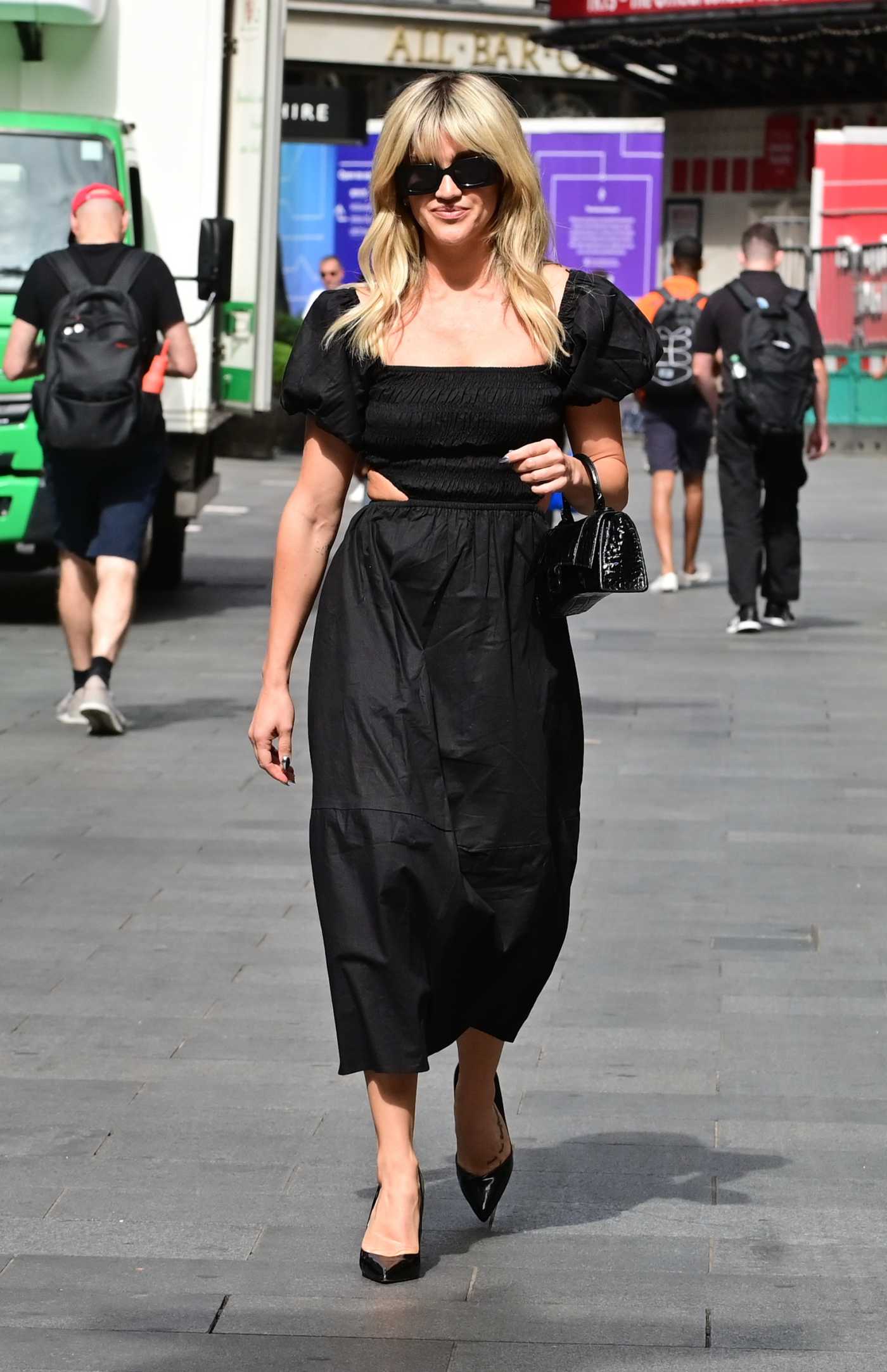 Ashley Roberts in a Black Dress Leaves the Global Radio at Leicester Square in London 07/13/2022