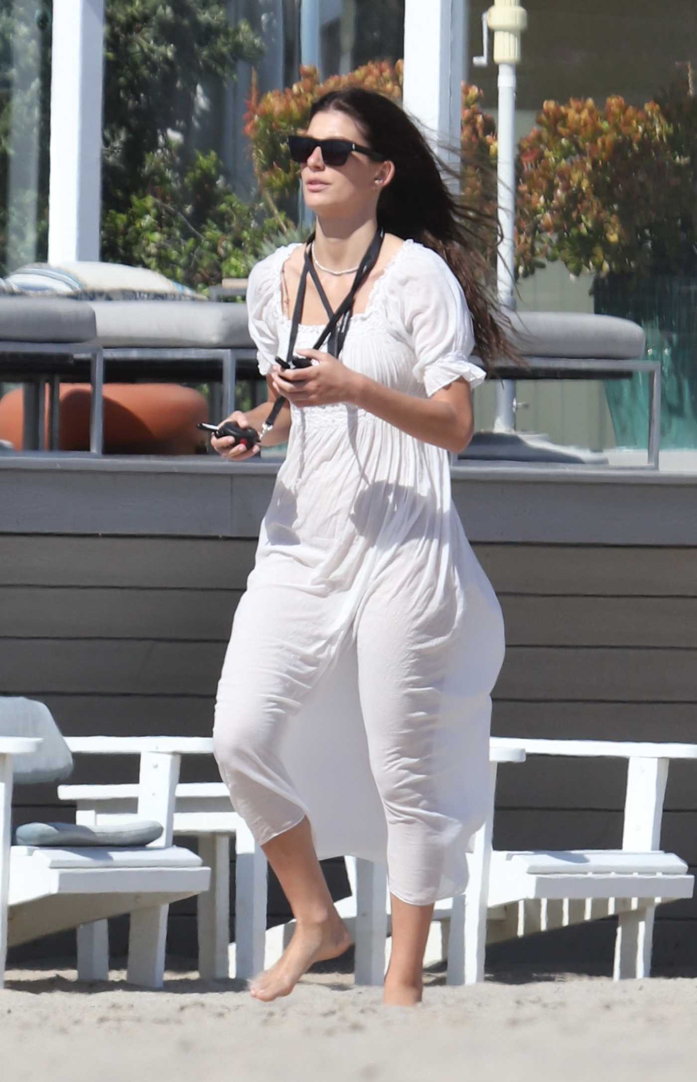 Camila Morrone in a White Dress Was Seen on the Beach in Malibu 07/03/2022