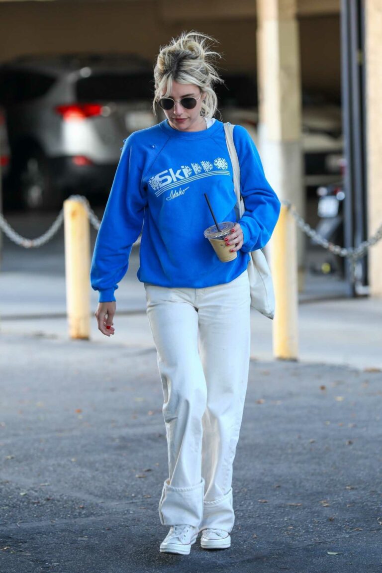 Emma Roberts in a Blue Sweatshirt