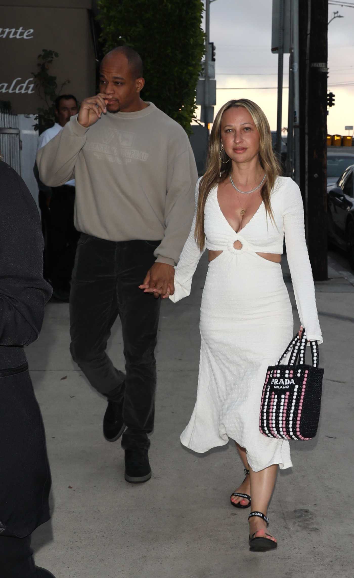 Jennifer Meyer in a White Dress Arrives with a Mystery Man at Giorgio Baldi Restaurant in Santa Monica 07/09/2022