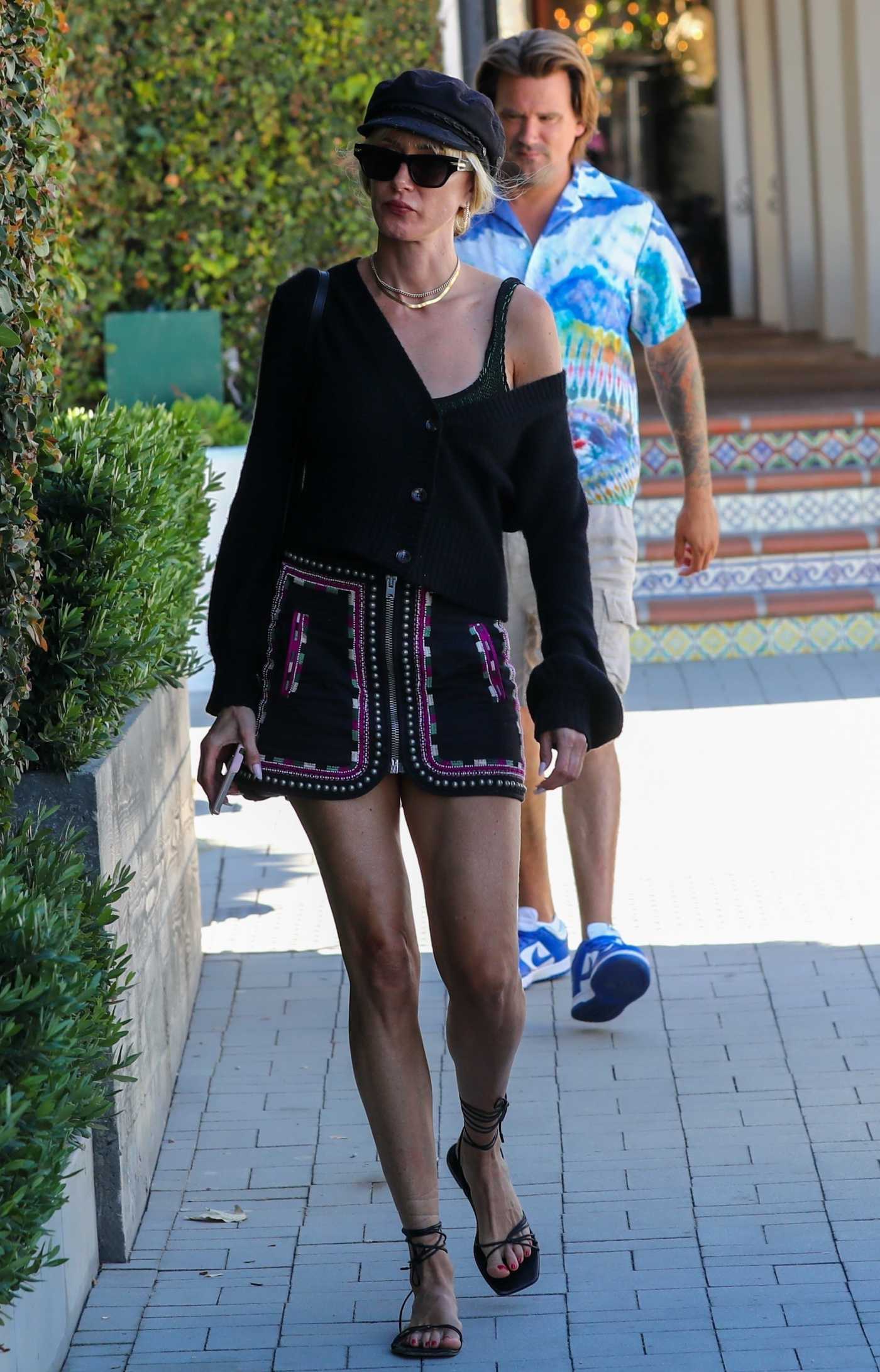 Kimberly Stewart in a Black Cap Goes Shopping in Malibu 07/10/2022