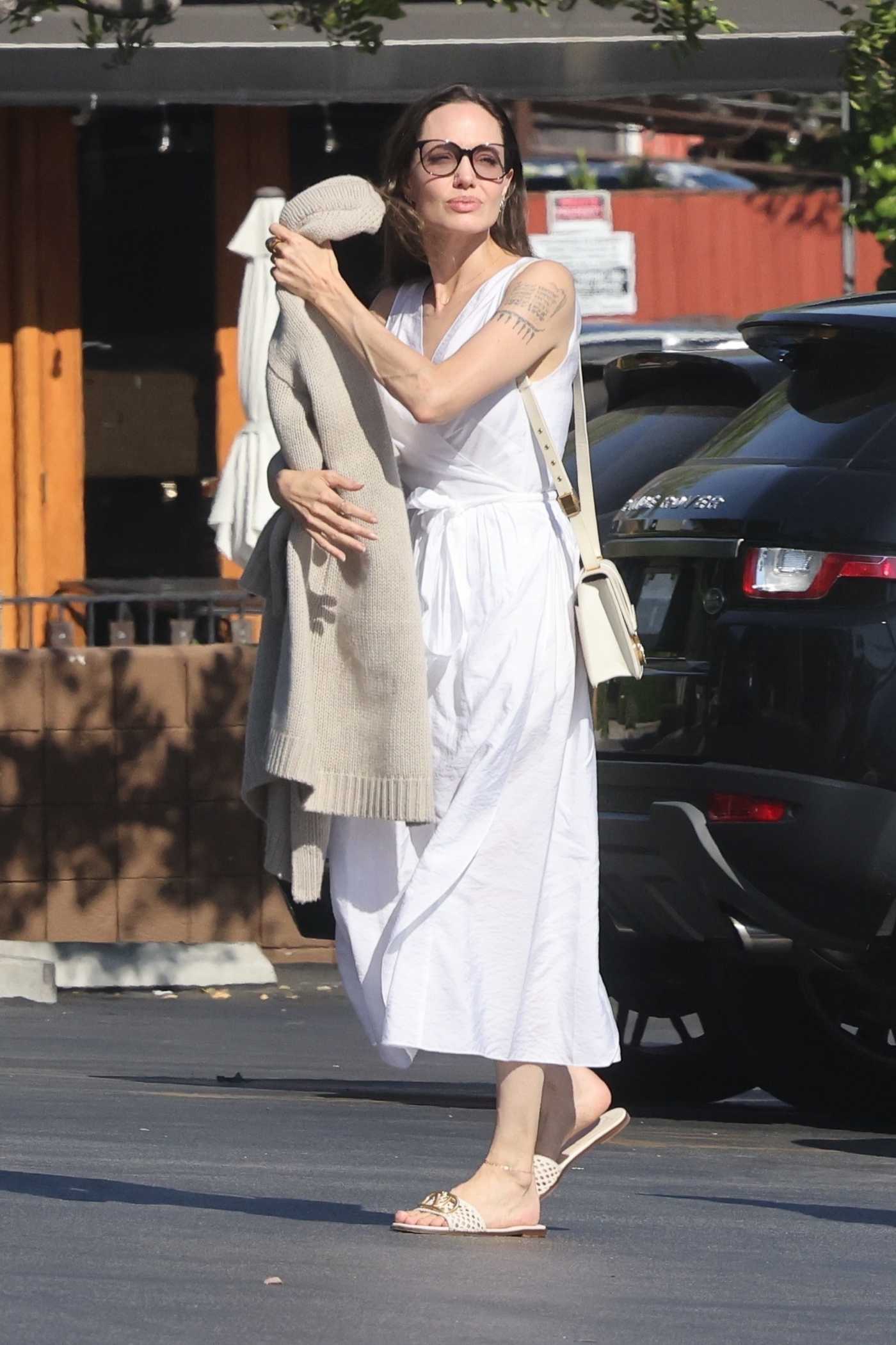 Angelina Jolie in a White Dress Was Seen Out with Her Son in Los Feliz 08/15/2022