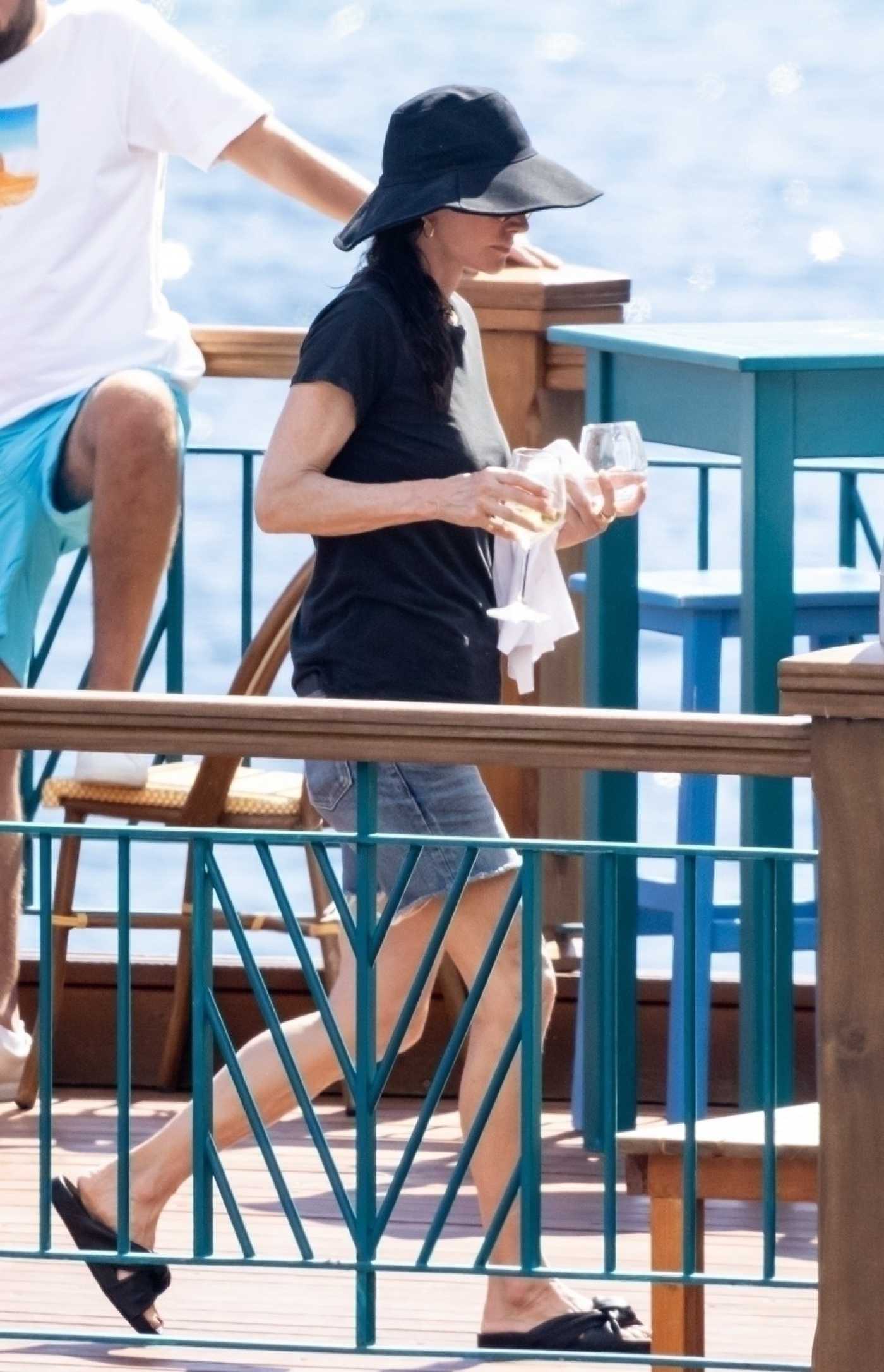 Courteney Cox in a Black Tee Was Seen Out with Her Boyfriend Johnny McDaid in Nerano 08/20/2022