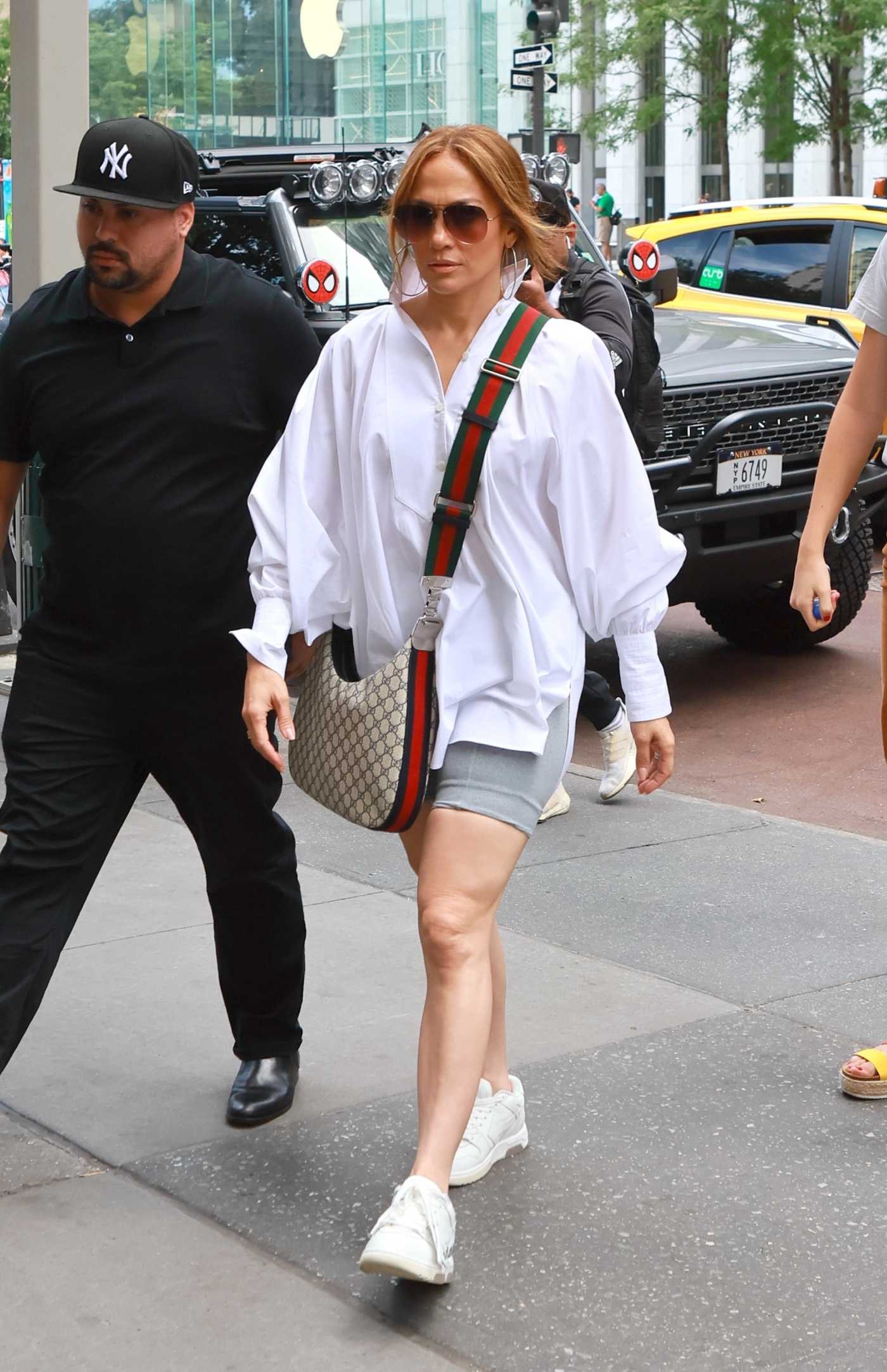 Jennifer Lopez in a White Blouse Goes Shopping at Bergdorf Goodman in New York 08/14/2022