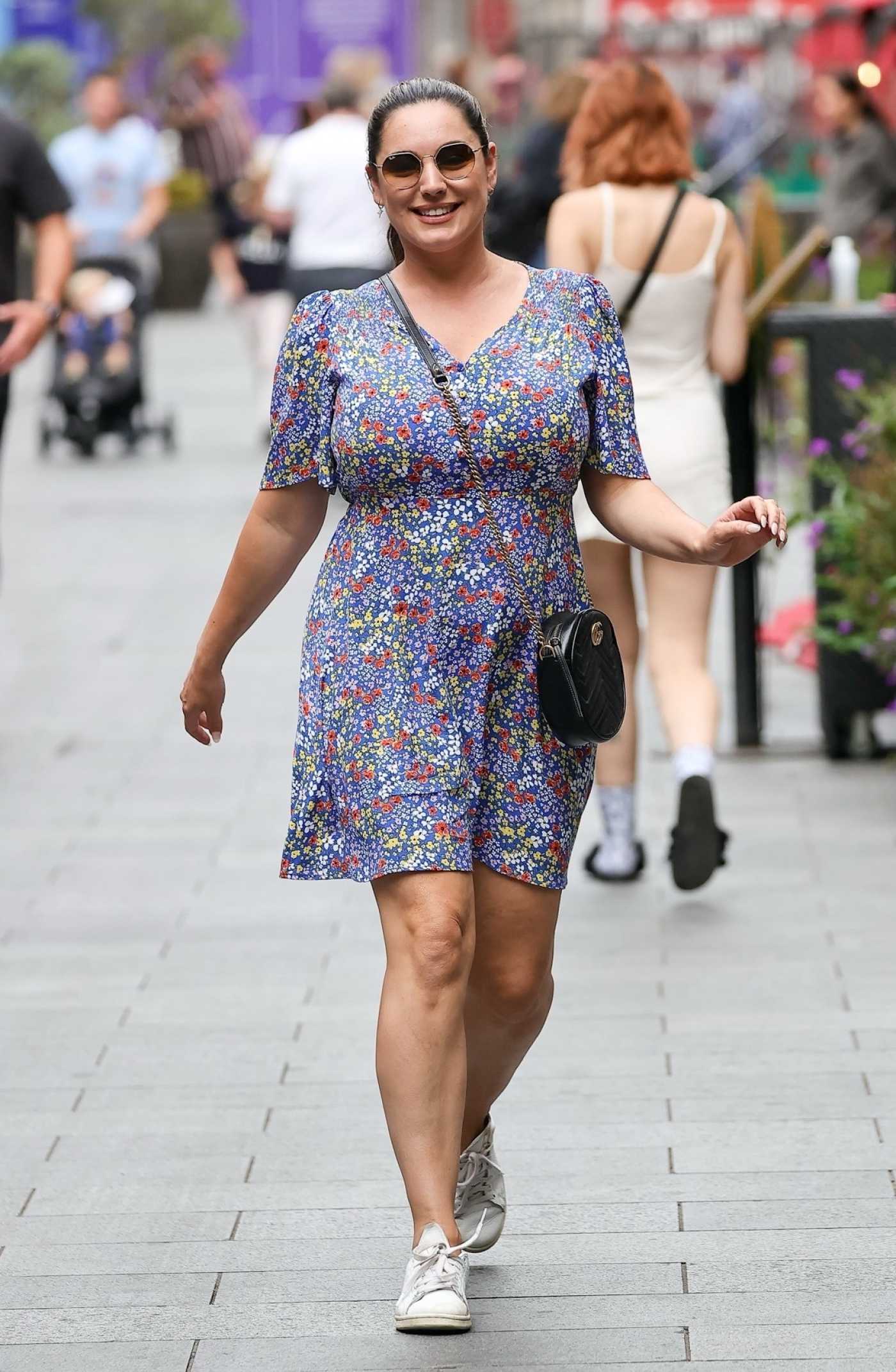 Kelly Brook in a Floral Dress Arrives at the Heart Radio in London 08/24/2022