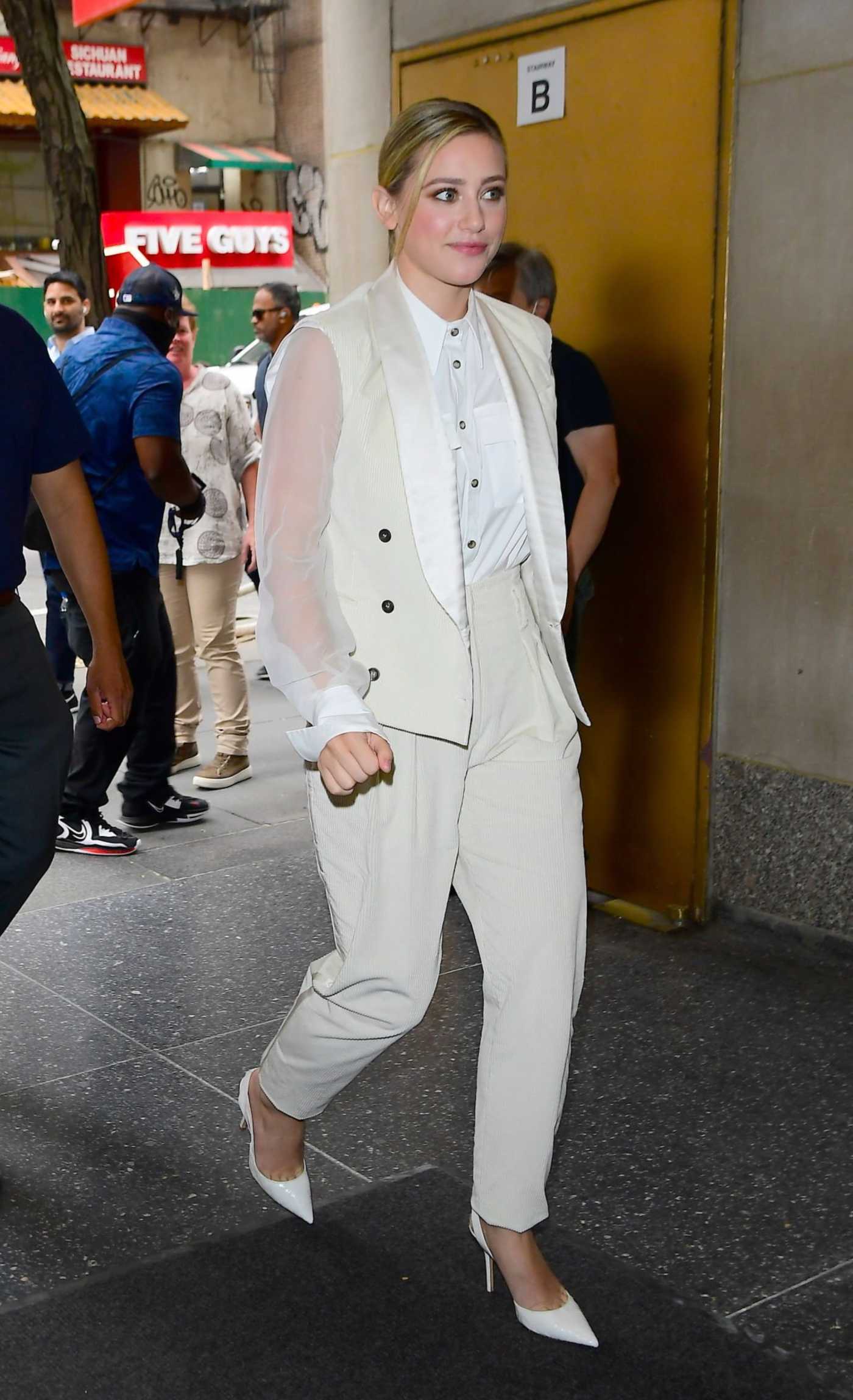 Lili Reinhart in a Beige Pantsuit Arrives at the Today Show in New York 08/10/2022