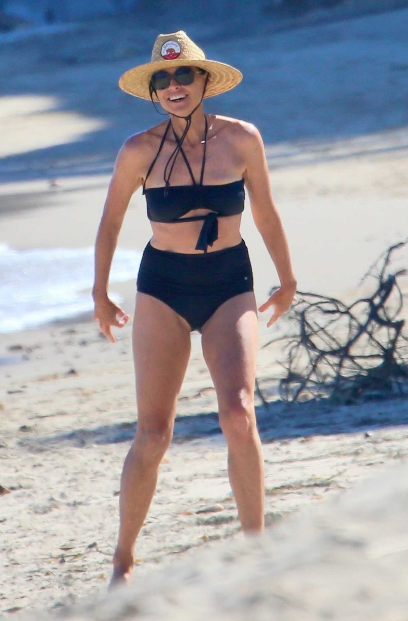 Minnie Driver in a Black Bikini on the Beach in Malibu 08/11/2022