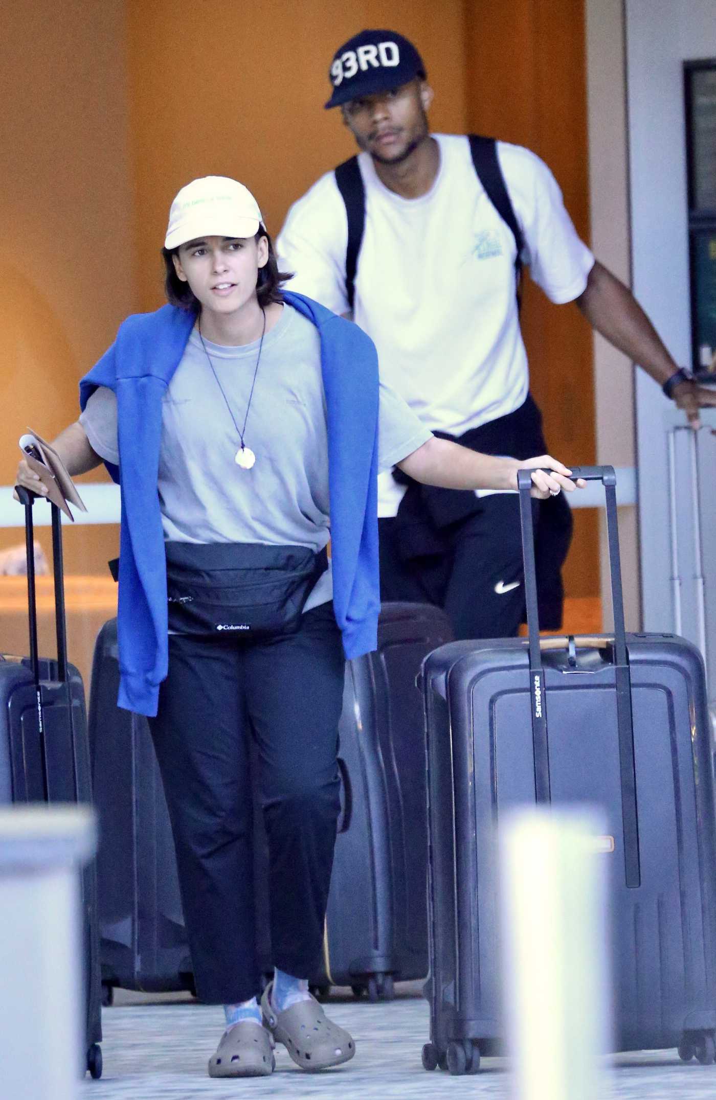 Naomi Scott in a White Cap Was Seen Out with Her Husband Jordan Spence in Cairns 08/06/2022