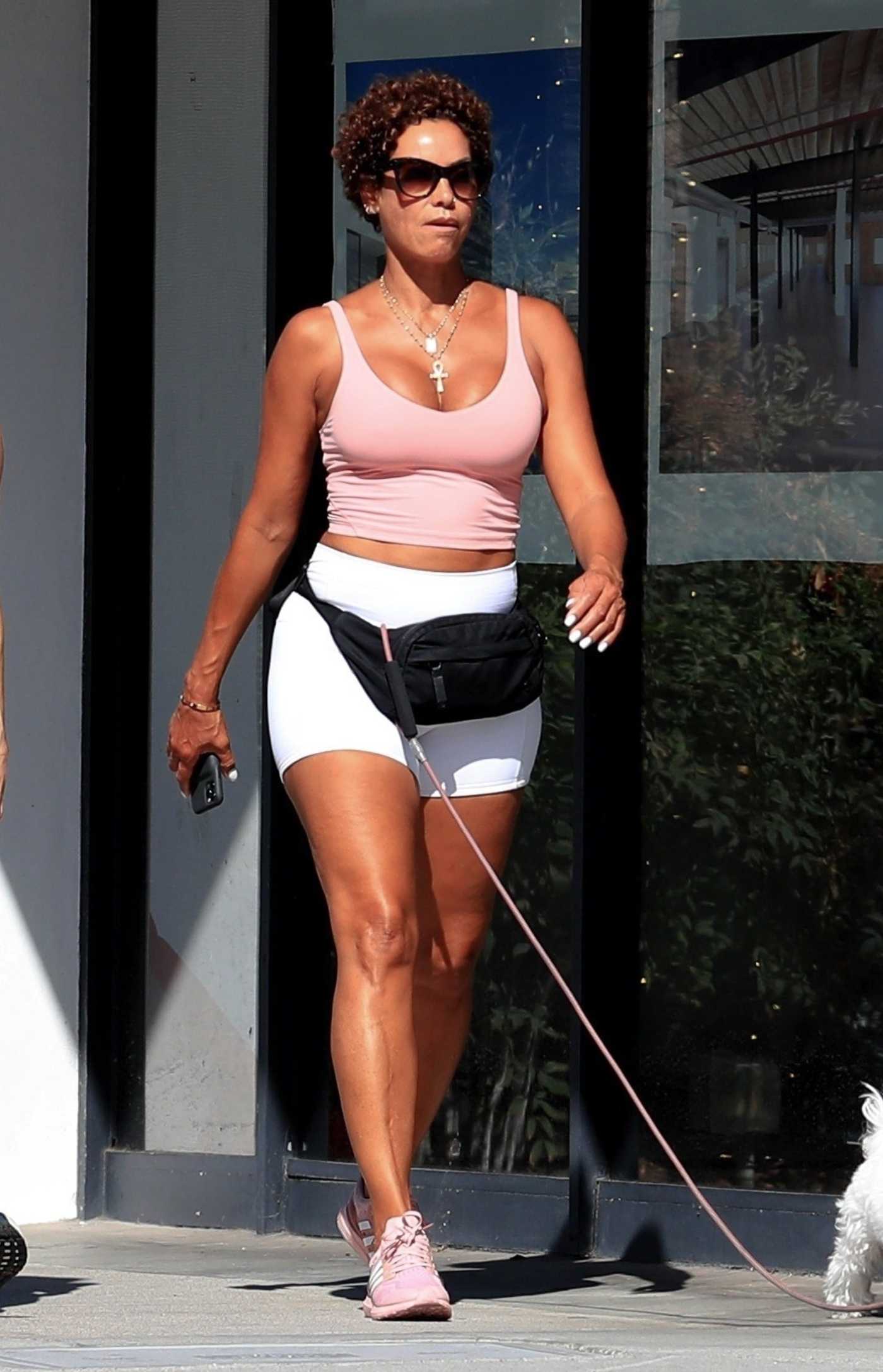 Nicole Murphy in a Pink Top Walks Her Dog in Beverly Hills 08/16/2022