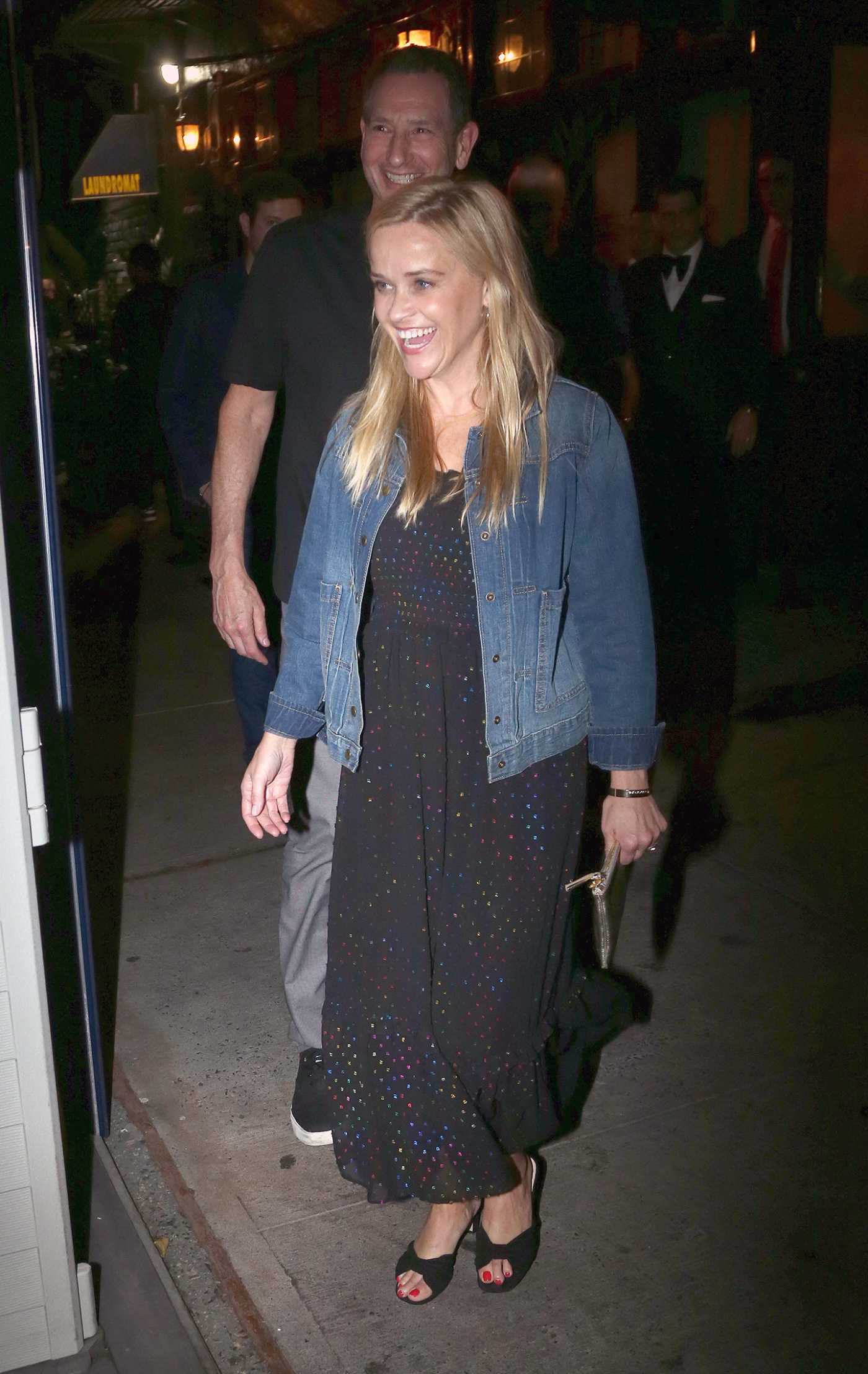 Reese Witherspoon in a Denim Jacket Out to Dinner at Trendy New Hot Spot Carbone in New York 08/27/2022