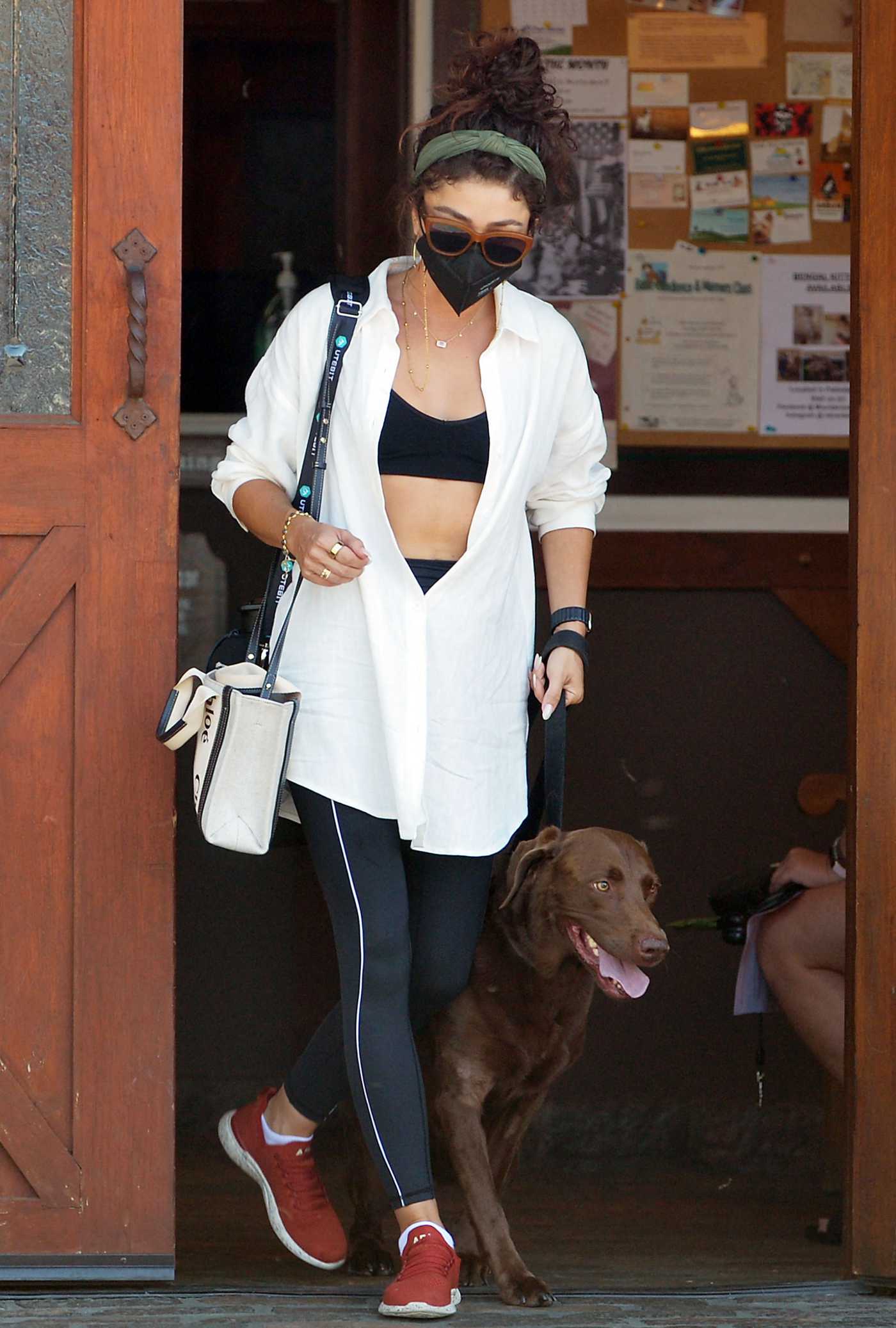 Sarah Hyland in a White Shirt Takes Her Dog to the Vet in Los Angeles 08/04/2022