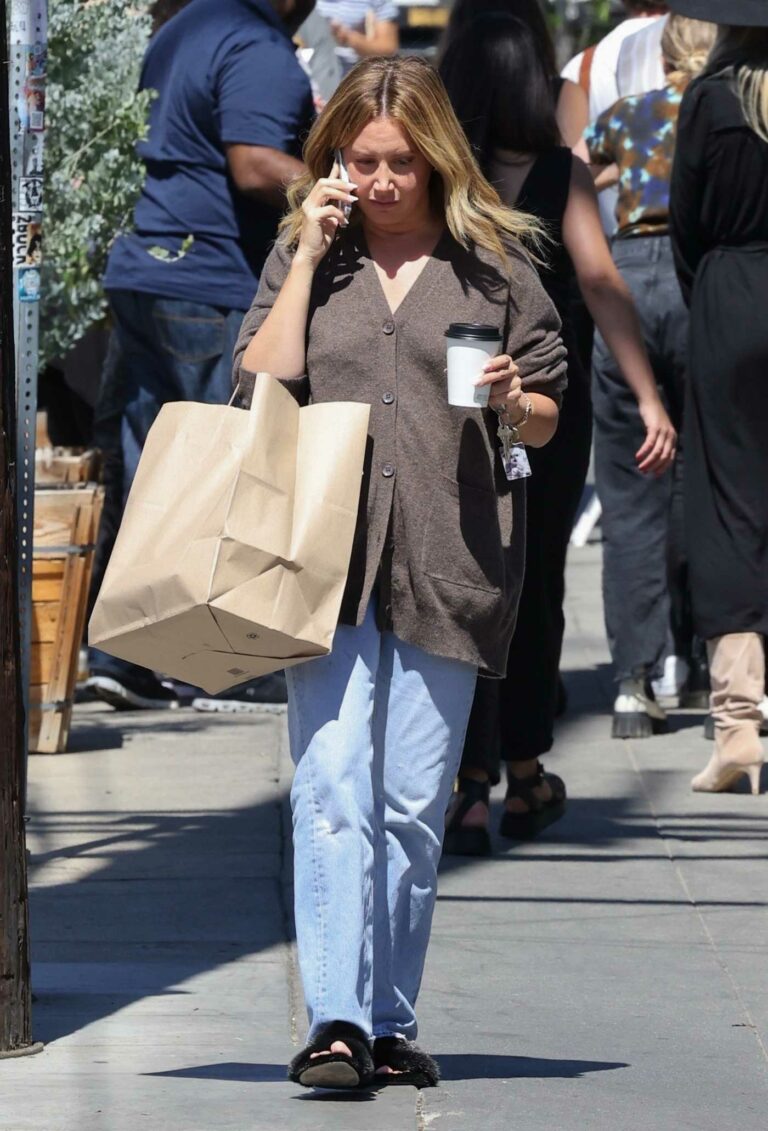 Ashley Tisdale in a Brown Cardigan