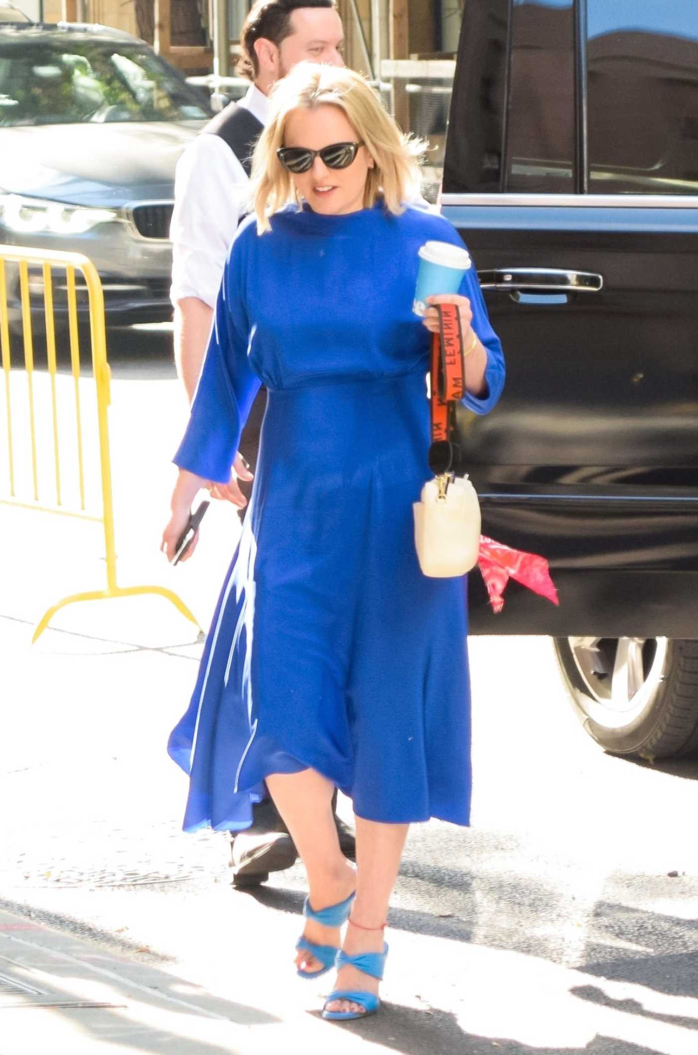 Elisabeth Moss in a Blue Dress Arrives at The View TV Show in New York City 09/20/2022